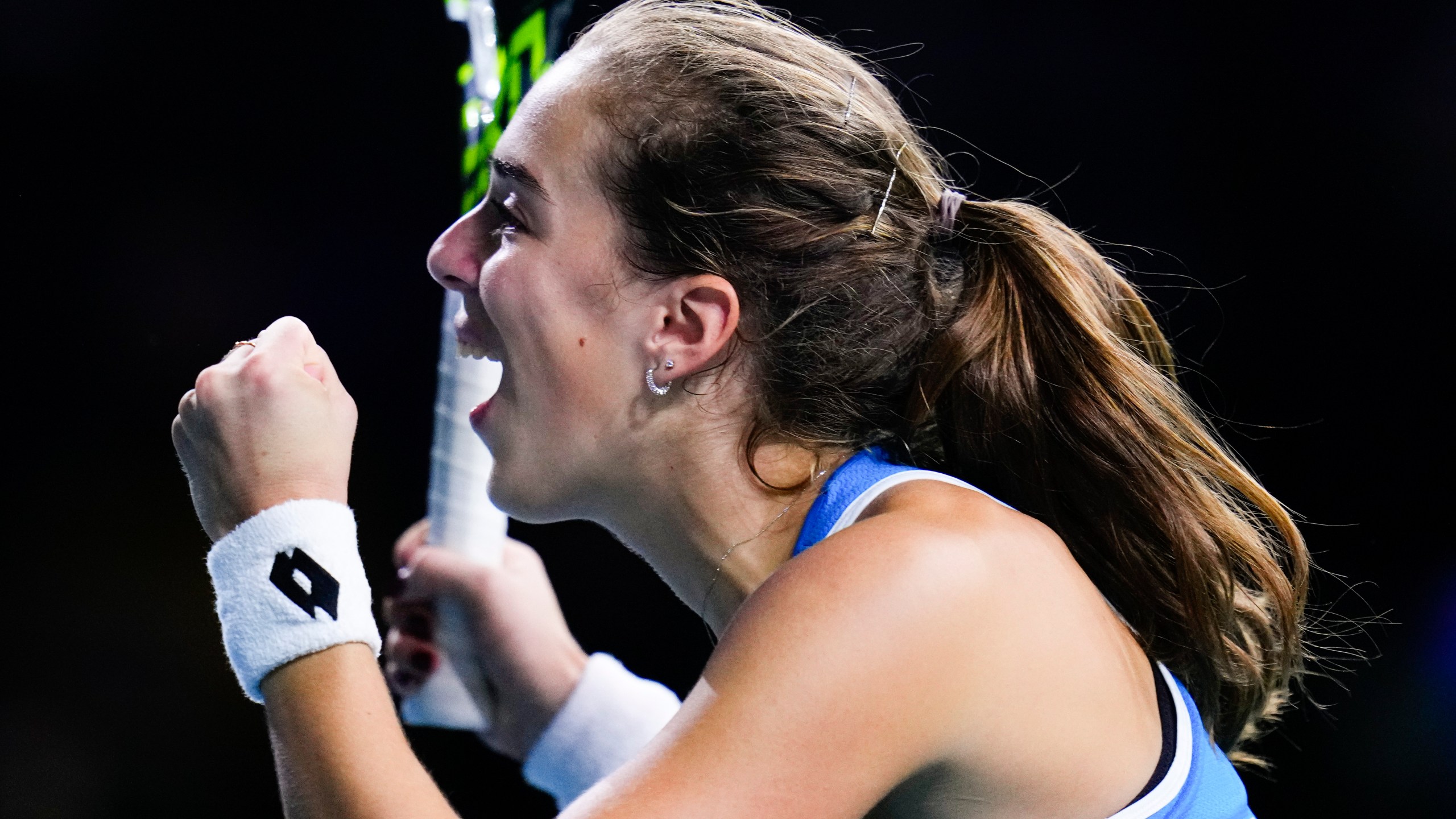 Italy's Lucia Bronzetti celebrates during the Billie Jean King Cup final against Slovakia's Viktoria Hruncakova at the Martin Carpena Sports Hall in Malaga, southern Spain, on Wednesday, Nov. 20, 2024. (AP Photo/Manu Fernandez)