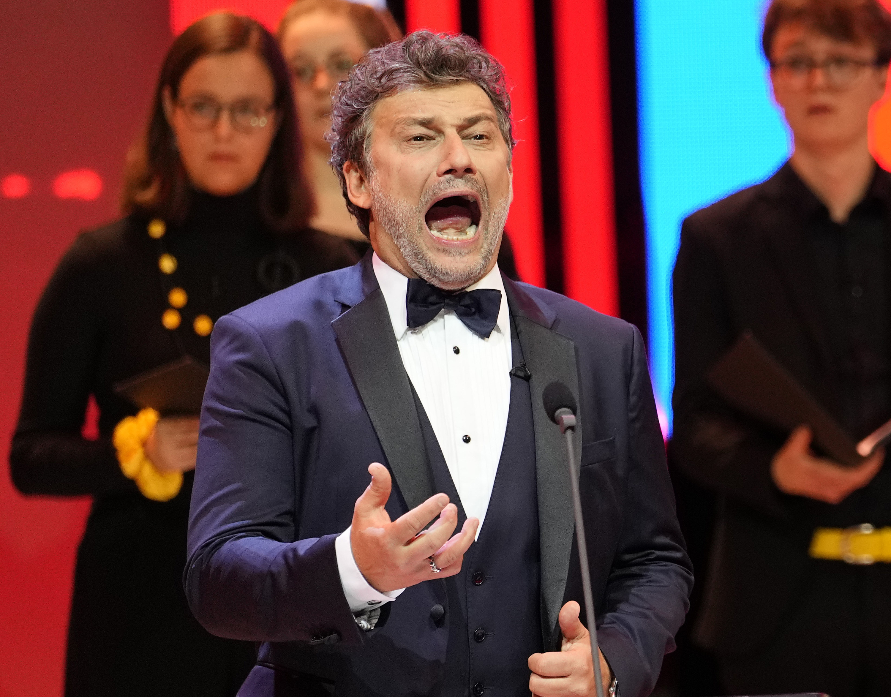 FILE - Tenor Jonas Kaufmann performs during the draw for the UEFA Euro 2024 soccer tournament finals in Hamburg, Germany on Dec. 2, 2023. Kaufmann has canceled his appearance in the production of Verdi's “La Forza del Destino” opening the season at Milan's Teatro alla Scala on Dec. 7. (AP Photo/Martin Meissner, File)