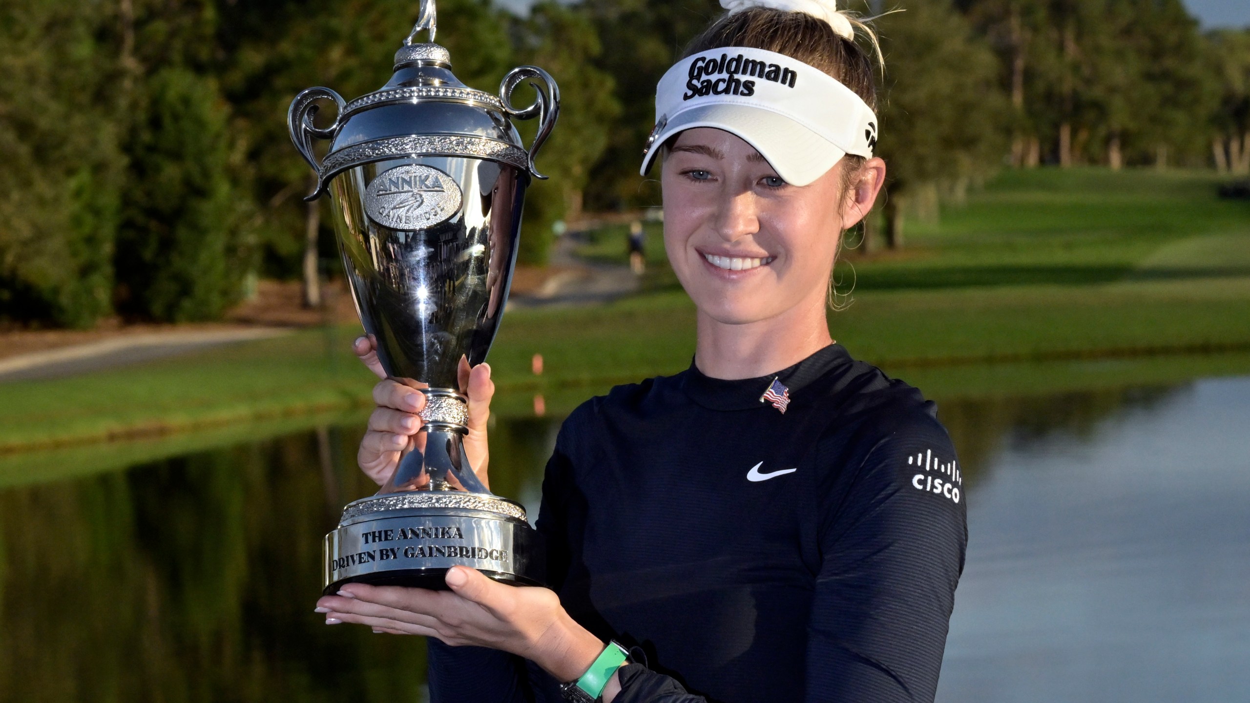 Nelly Korda holds the championship trophy after winning the the LPGA Annika golf tournament at Pelican Golf Club, Sunday, Nov. 17, 2024, in Belleair, Fla. (AP Photo/Steve Nesius)