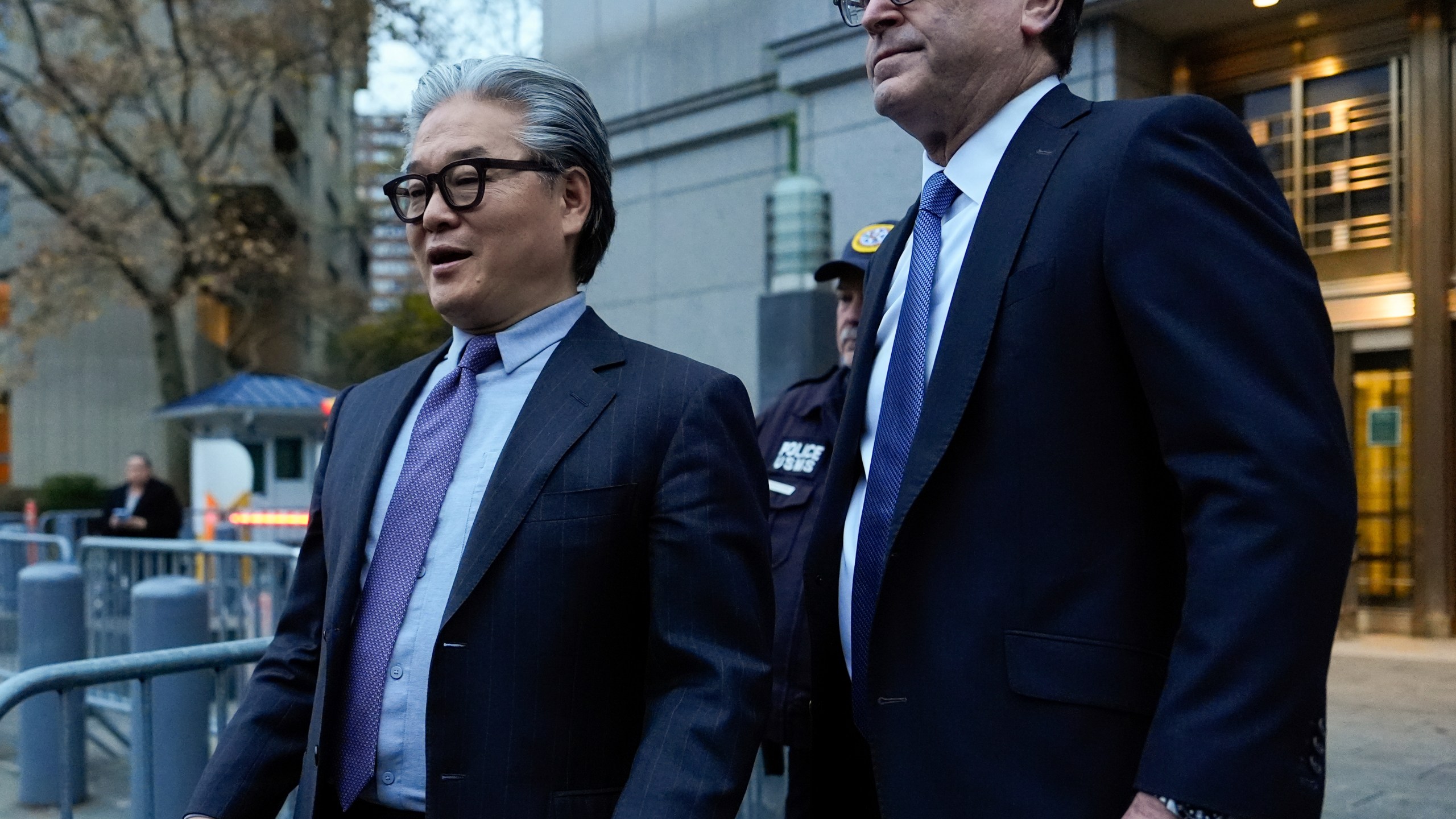 Bill Hwang, left, founder of Archegos Capital Management, departs federal court, Wednesday, Nov. 20, 2024, in New York. (AP Photo/Julia Demaree Nikhinson)