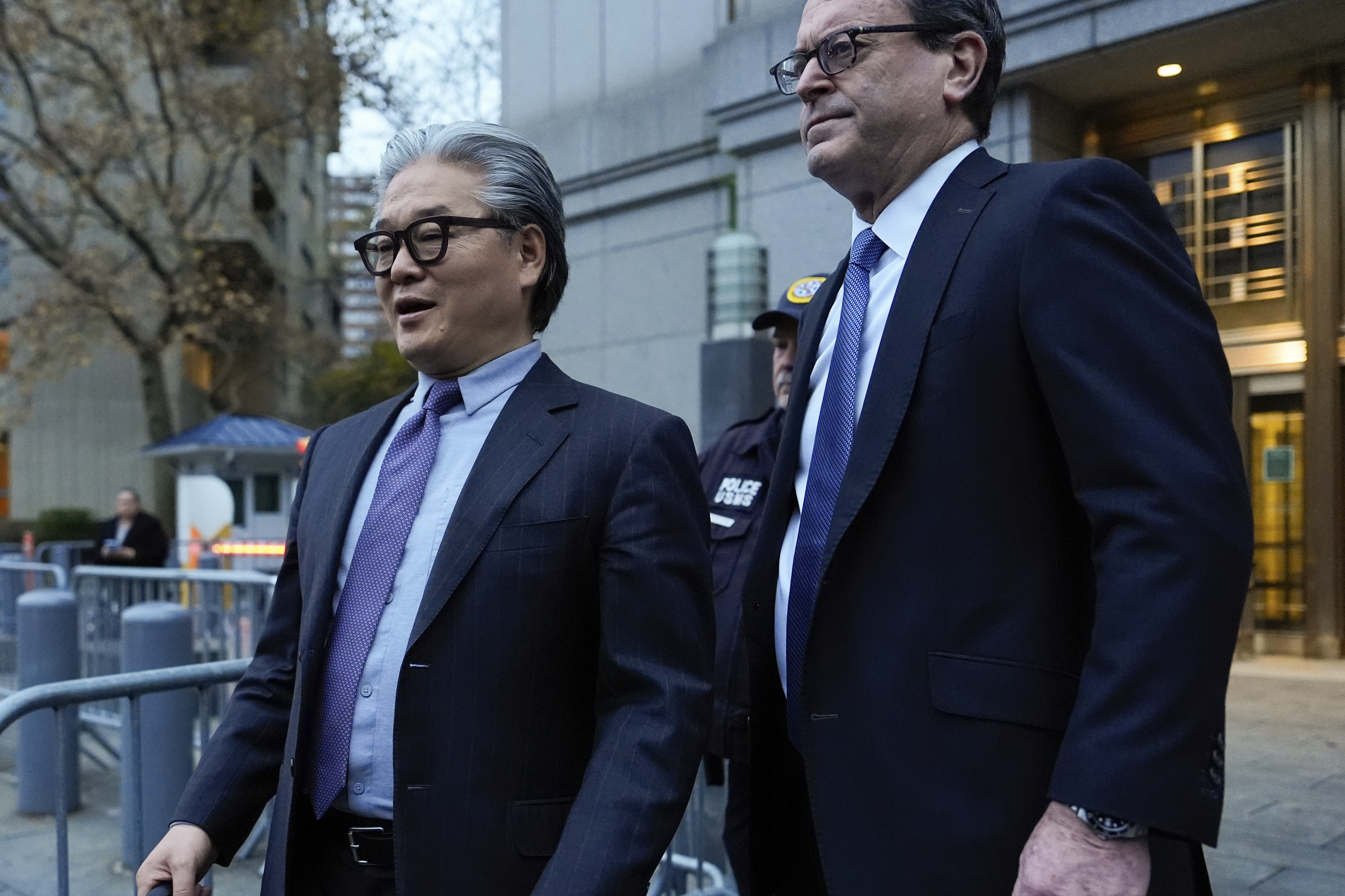 Bill Hwang, left, founder of Archegos Capital Management, departs federal court, Wednesday, Nov. 20, 2024, in New York. (AP Photo/Julia Demaree Nikhinson)