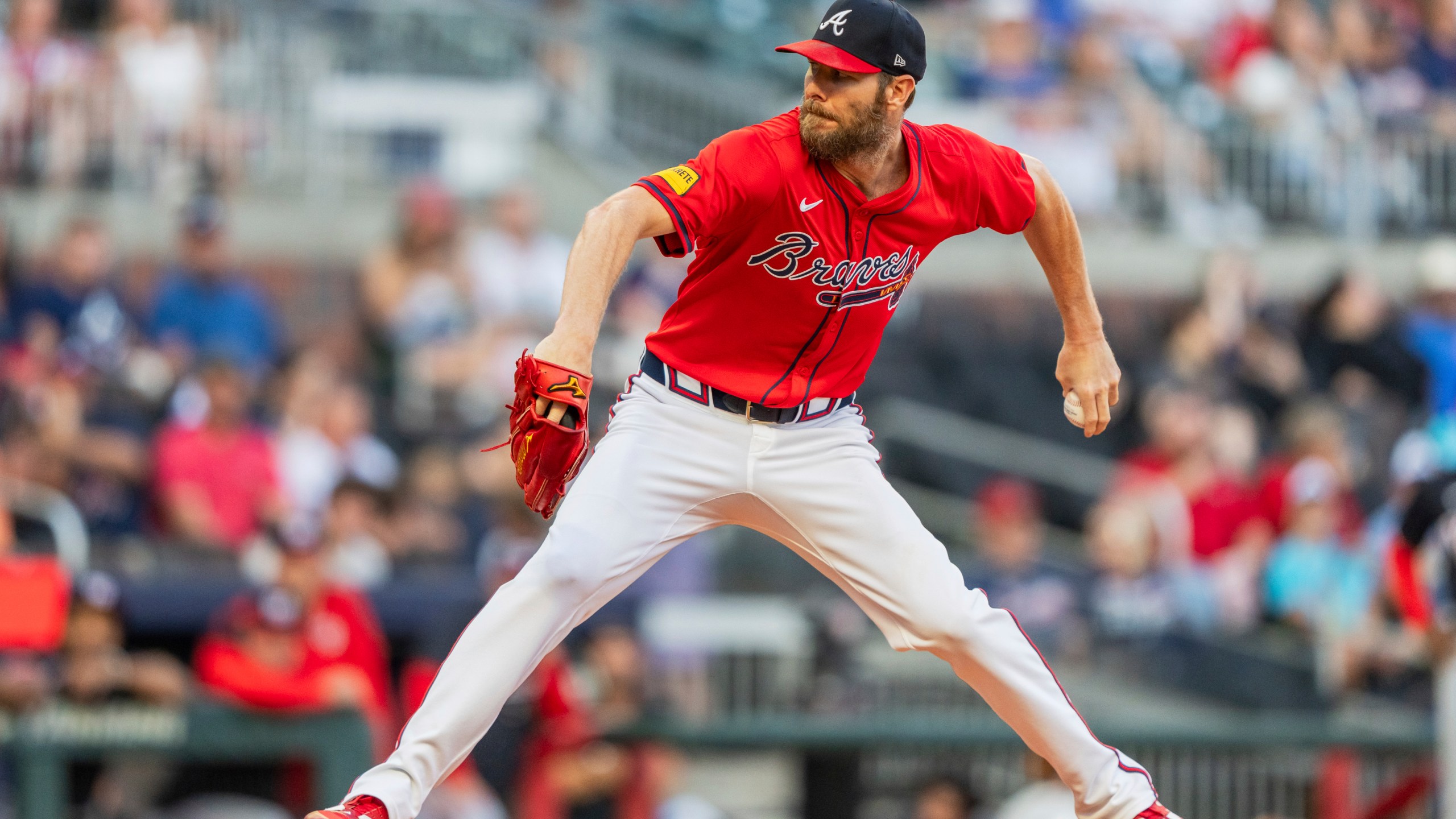 FILE - Atlanta Braves pitcher Chris Sale throws in the first inning of a baseball game, Aug. 23, 2024, in Atlanta. (AP Photo/Jason Allen, File)