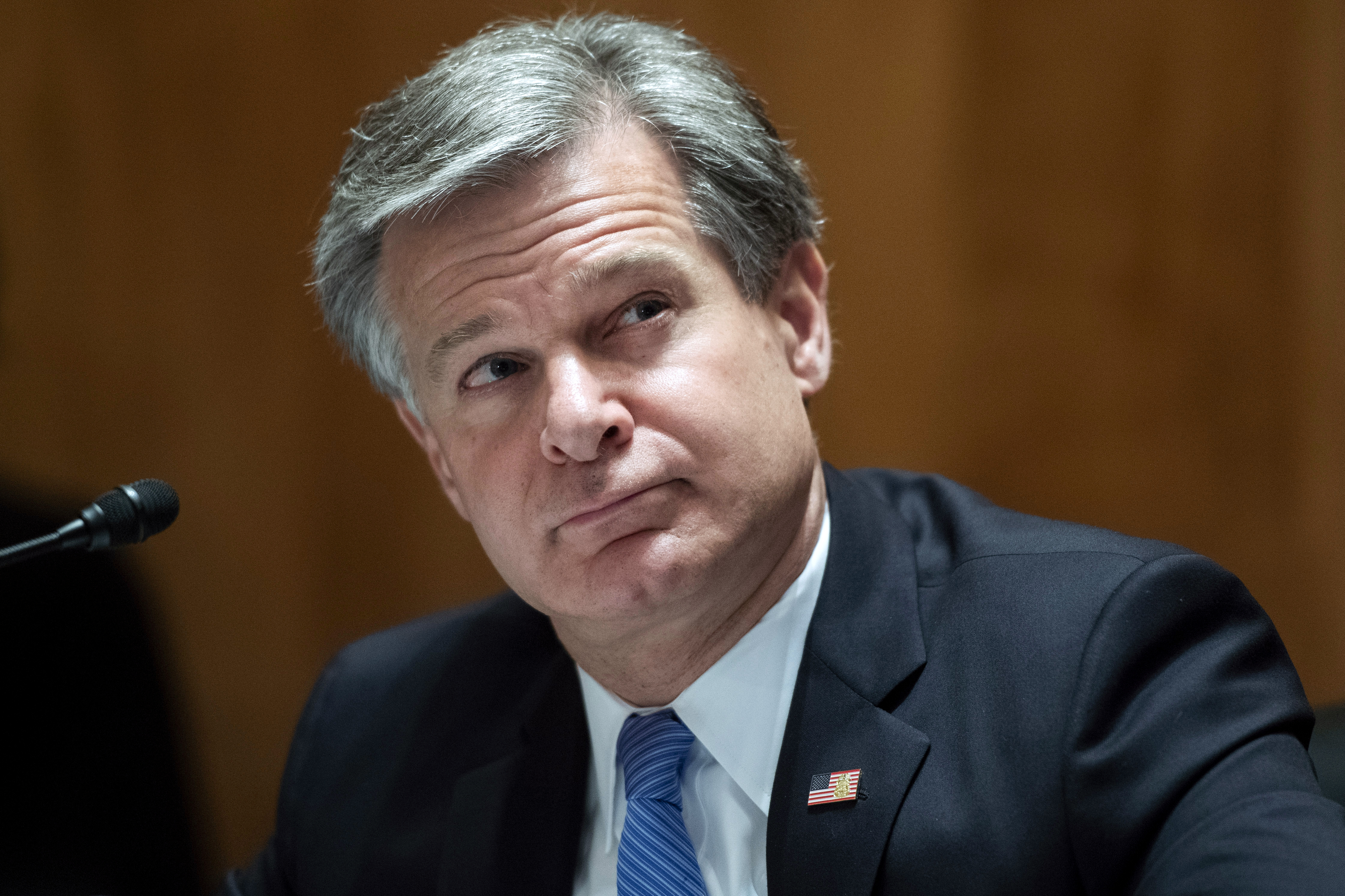 FILE - FBI Director Christopher Wray testifies on Capitol Hill in Washington, Sept. 24, 2020. (Tom Williams/Pool via AP, File)