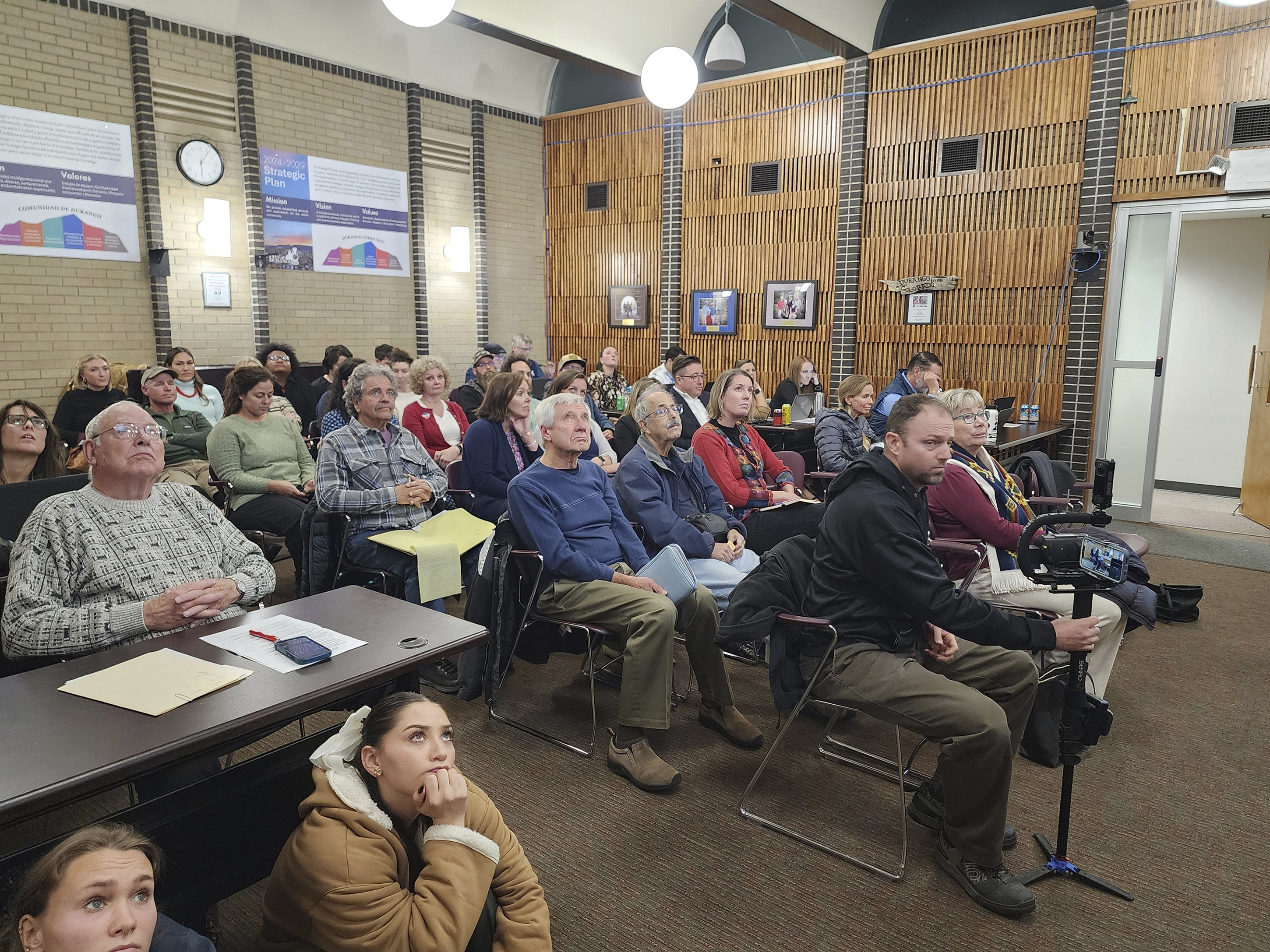 Residents attend a Durango City Council meeting to speak about the continued fluoridation of the city's drinking water, Nov. 5, 2024, in Durango, Colo. (Christian Burney/The Durango Herald via AP)