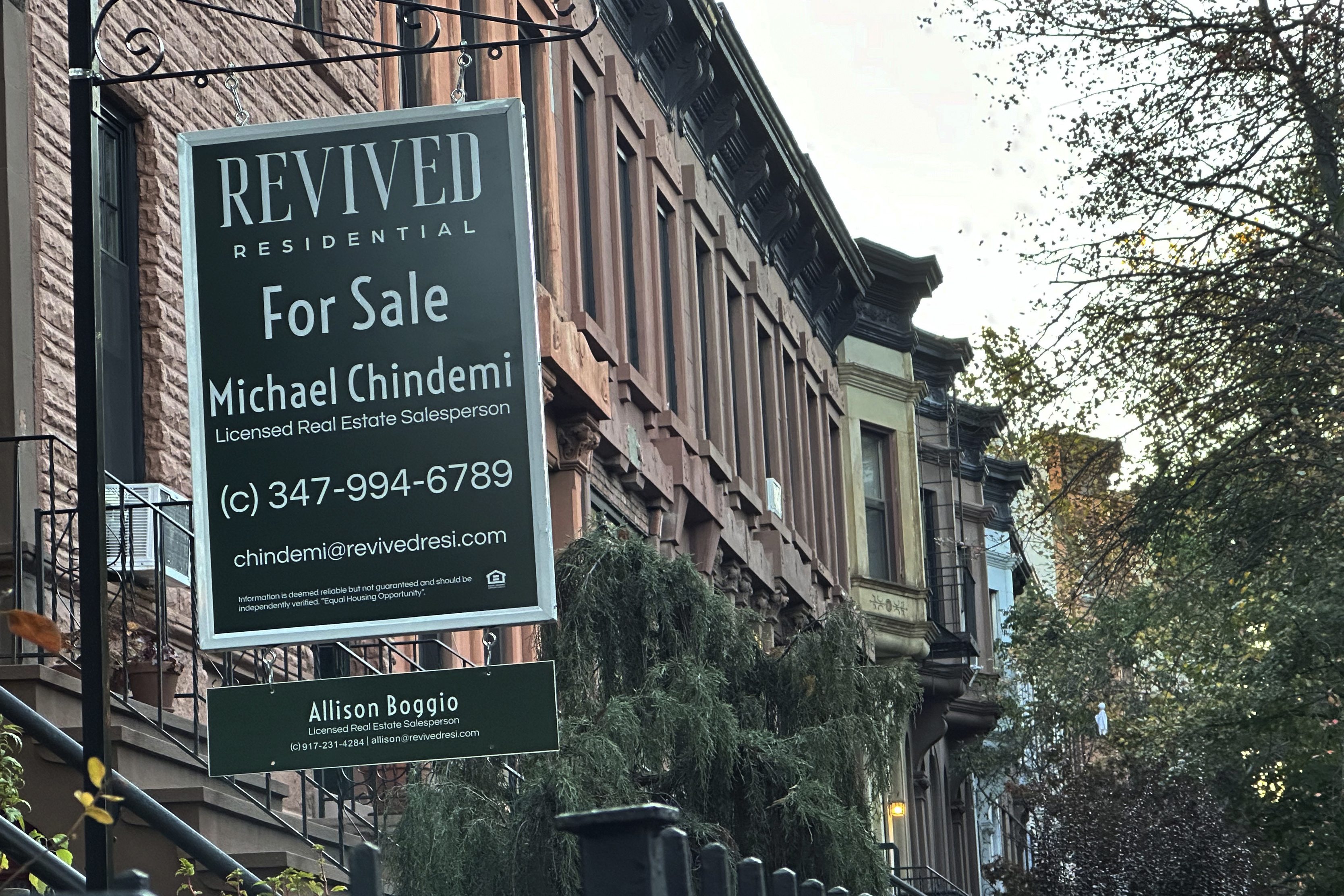 FILE - A for sale sign hangs outside a home in the Brooklyn borough of New York on Nov. 13, 2024. (AP Photo/Peter Morgan, File)