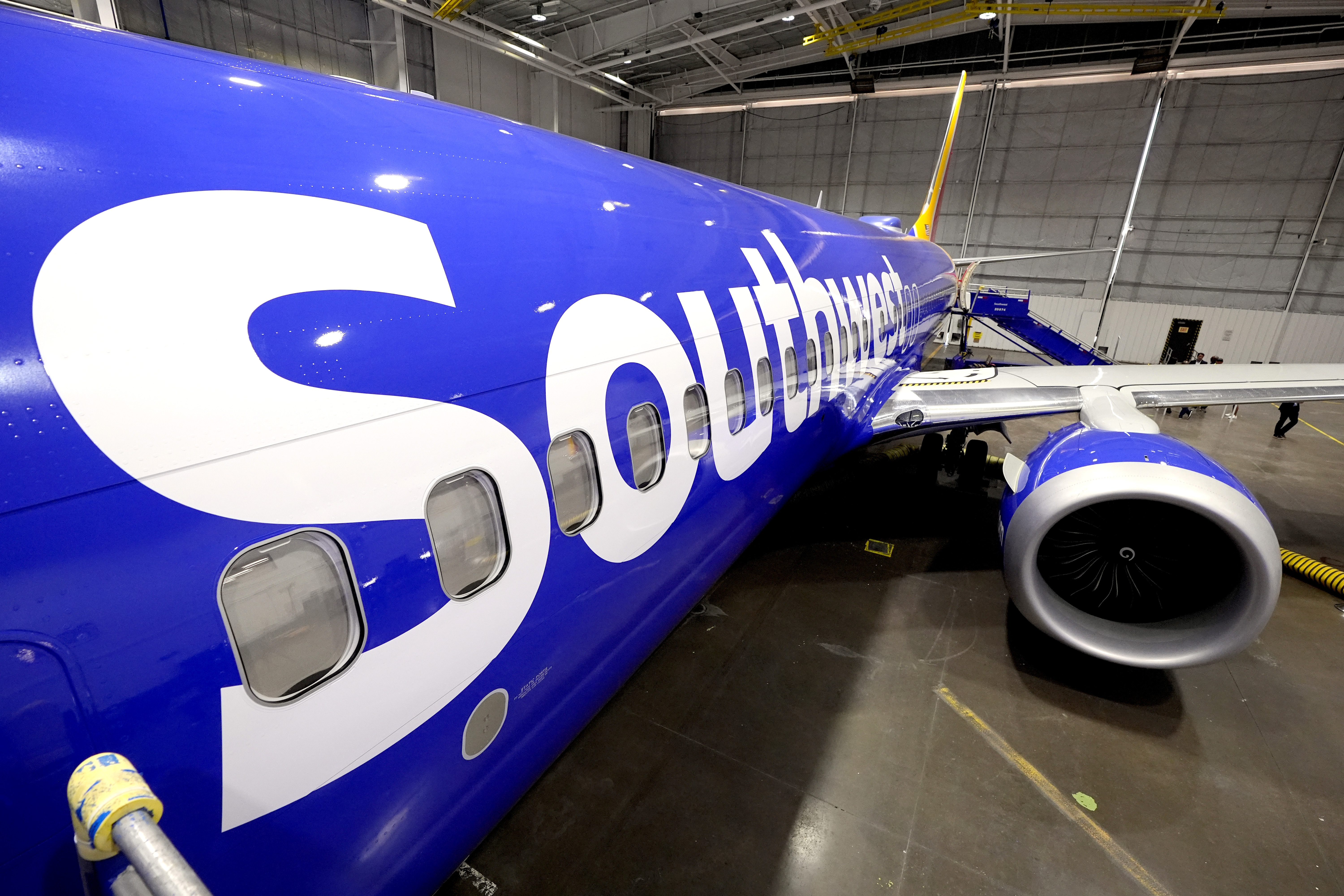 FILE - A retrofitted Southwest Airlines passenger jet is shown in a hangar at Love Field on Sept. 26, 2024, in Dallas. (AP Photo/Tony Gutierrez, File)