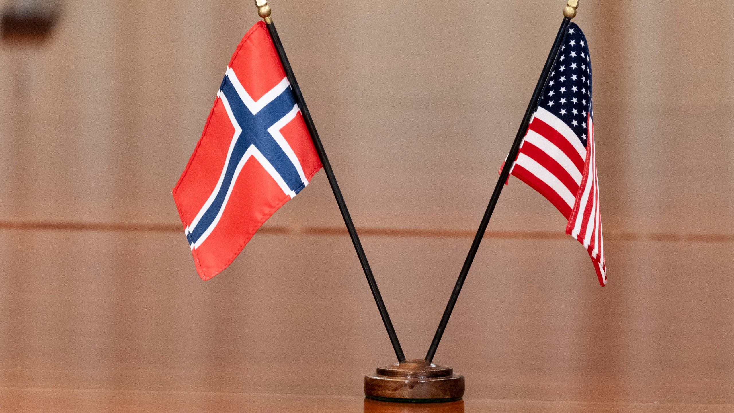 ALTERNATIVE CROP FILE - The Norway, left, and US flags are seen on the table at the Pentagon, on Sept. 20, 2022, in Washington. (AP Photo/Alex Brandon, File)