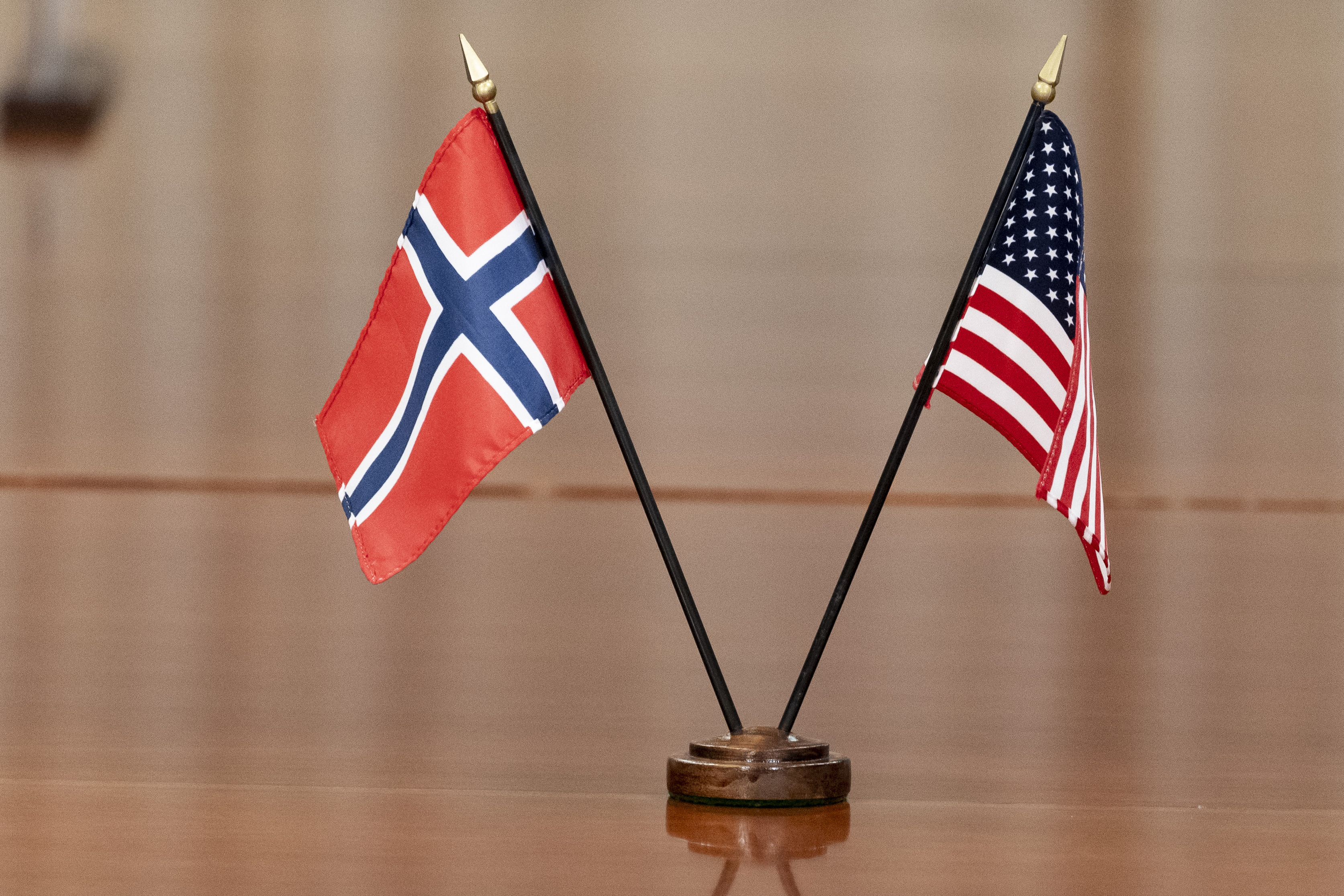 ALTERNATIVE CROP FILE - The Norway, left, and US flags are seen on the table at the Pentagon, on Sept. 20, 2022, in Washington. (AP Photo/Alex Brandon, File)