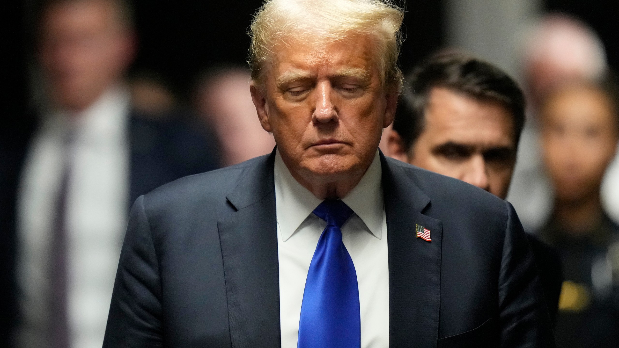 FILE - Former President Donald Trump walks to make comments to members of the media after a jury convicted him of felony crimes for falsifying business records in a scheme to illegally influence the 2016 election, at Manhattan Criminal Court, May 30, 2024, in New York. (AP Photo/Seth Wenig, Pool, File)