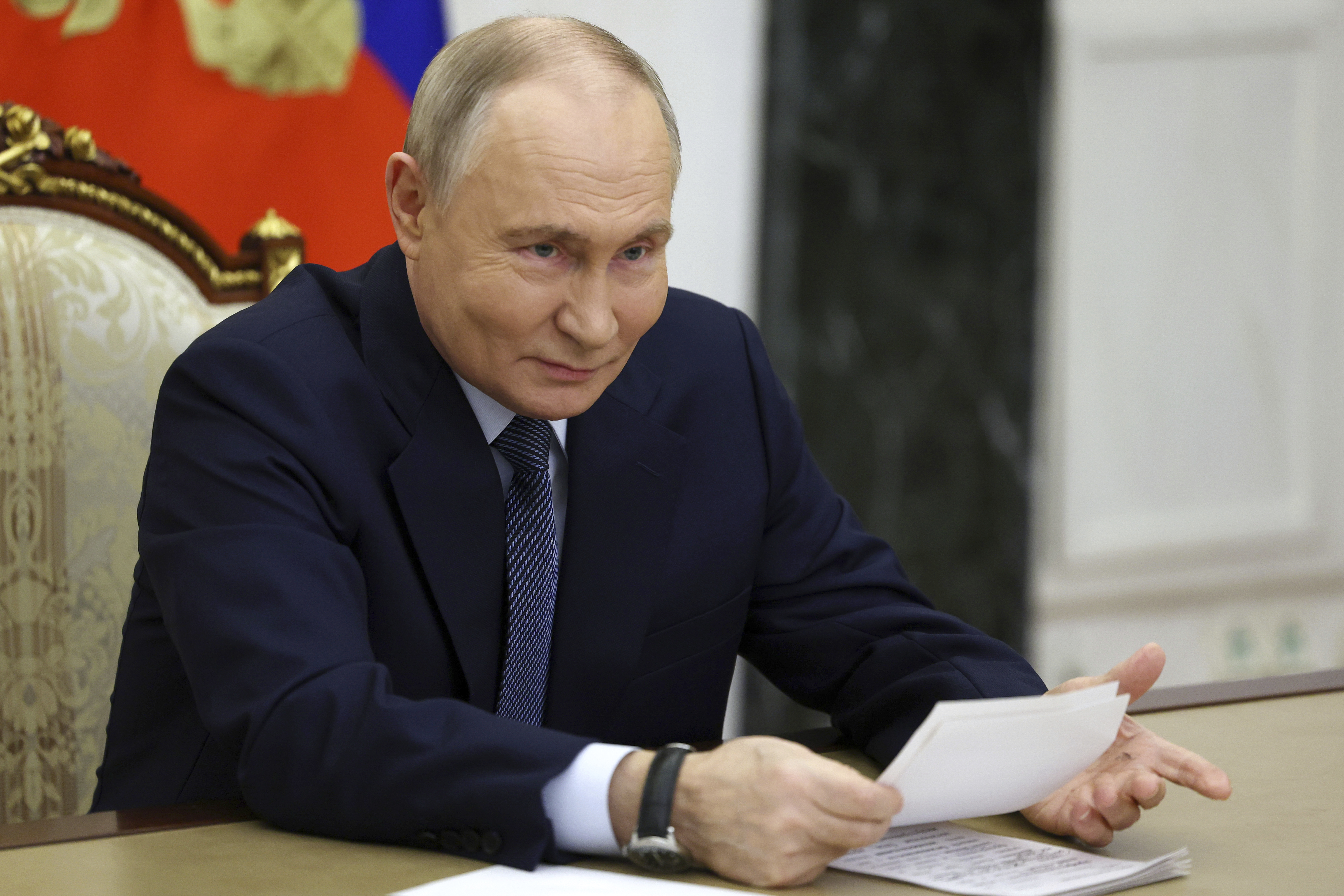 Russian President Vladimir Putin speaks during a meeting with the leadership of the Russian Ministry of Defense, representatives of the military-industrial complex and developers of missile systems at the Kremlin in Moscow, Russia, Friday, Nov. 22, 2024. (Vyacheslav Prokofyev/Sputnik, Kremlin Pool Photo via AP)