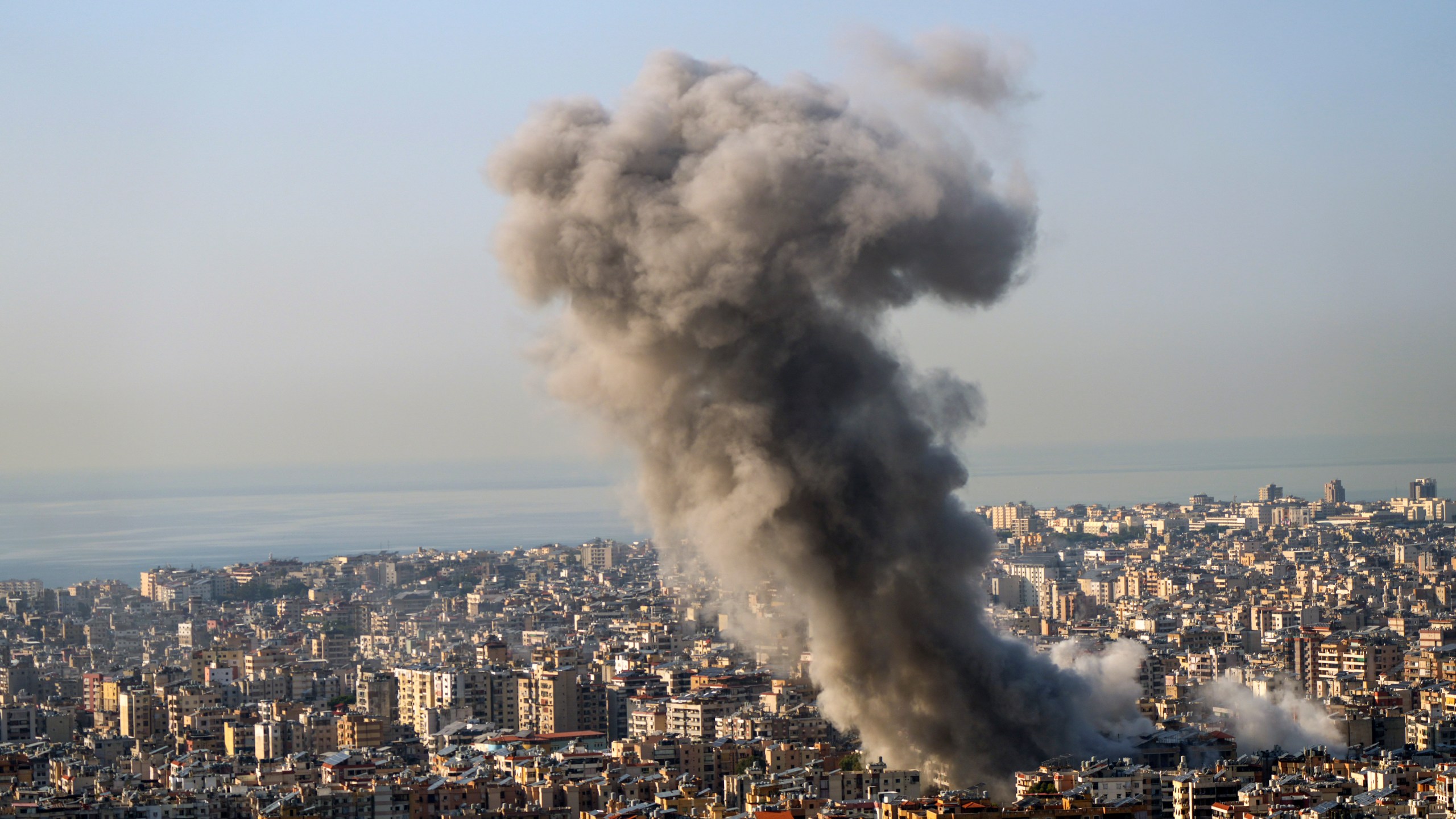 Smoke rises after an Israeli airstrike on Dahiyeh, in the southern suburb of Beirut, Lebanon, Saturday, Nov. 23, 2024. (AP Photo/Hassan Ammar)