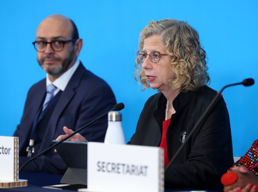 Inger Andersen, Executive Director of UNEP, right, speaks next to chair of the International Negotiating Committee, Luis Vayas Valdivieso, left, during the press conference for the fifth session of the Intergovernmental Negotiating Committee on Plastic Pollution in Busan, South Korea, Monday, Nov. 25, 2024. (Son Hyung-joo/Yonhap via AP)