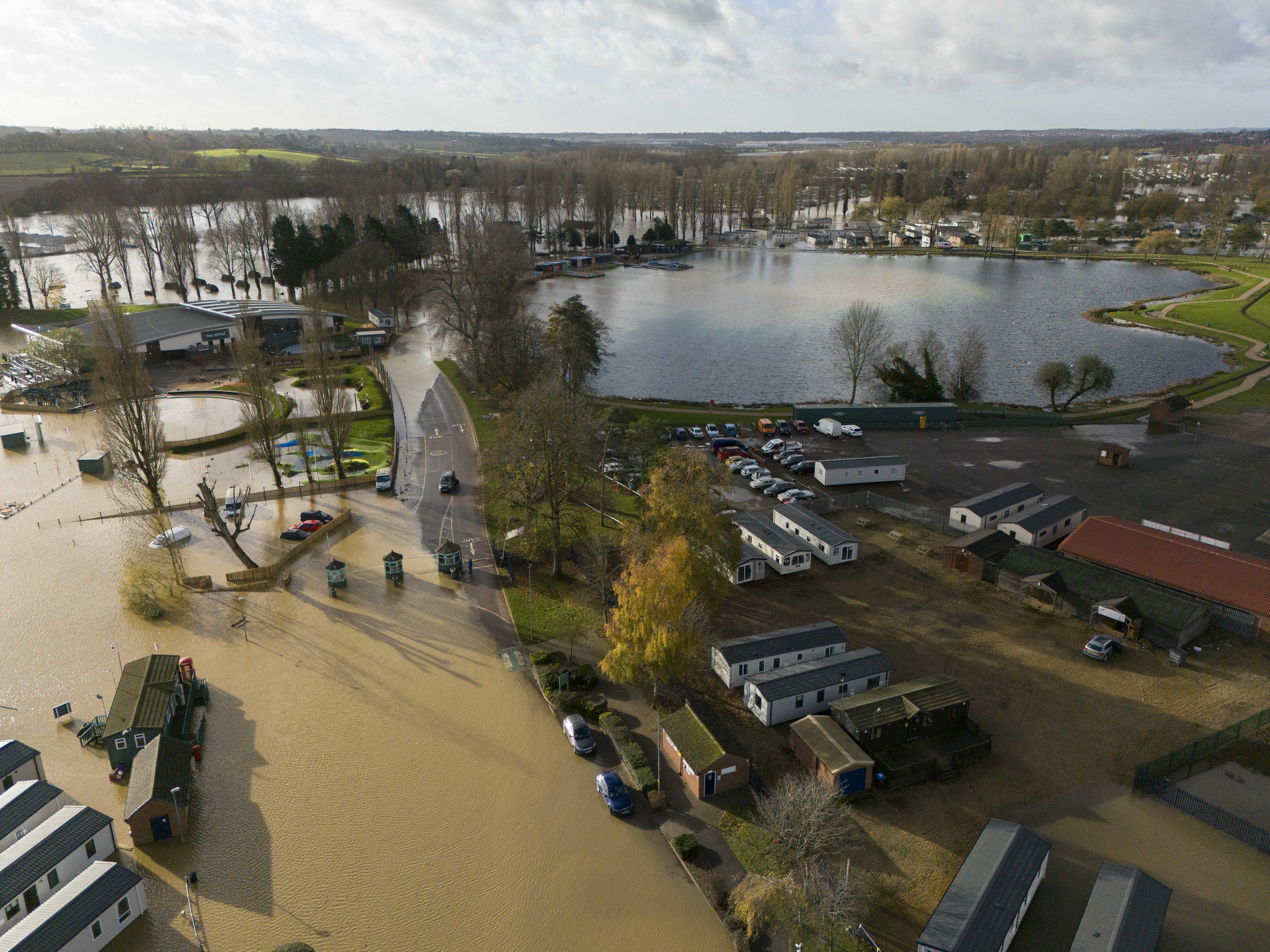 Floodwater covers parts of the Billing Aquadrome in Northamptonshire, England, Monday Nov. 25, 2024, after Storm Bert caused "devastating" flooding over the weekend. (Jordan Pettitt/PA via AP)