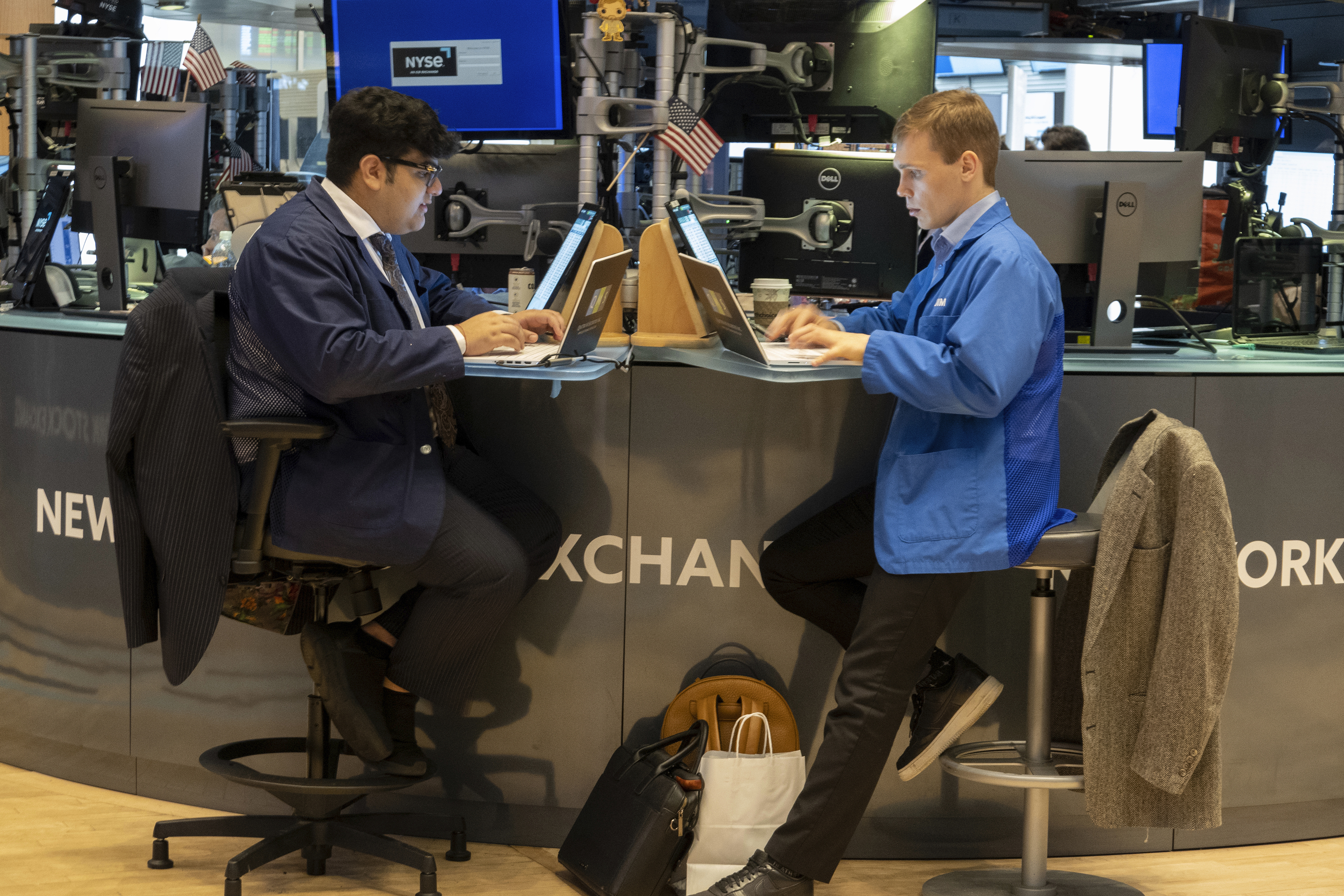 FILE - People work on the New York Stock Exchange trading floor in New York on November 21, 2024. (AP Photo/Ted Shaffrey, File)