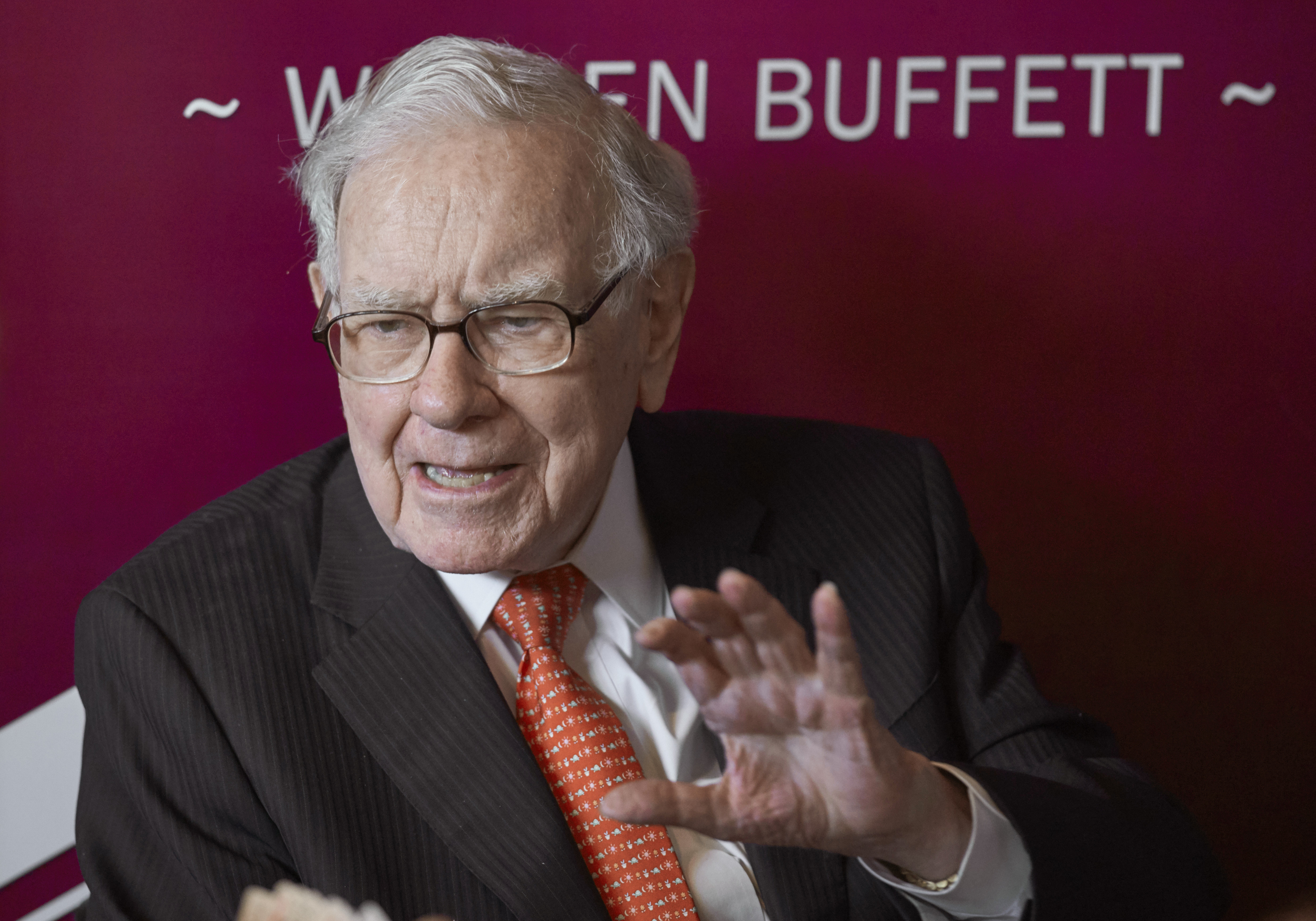 FILE - Warren Buffett, Chairman and CEO of Berkshire Hathaway, speaks during a game of bridge after the annual Berkshire Hathaway shareholders meeting in Omaha, Neb., on May 5, 2019. (AP Photo/Nati Harnik, File)