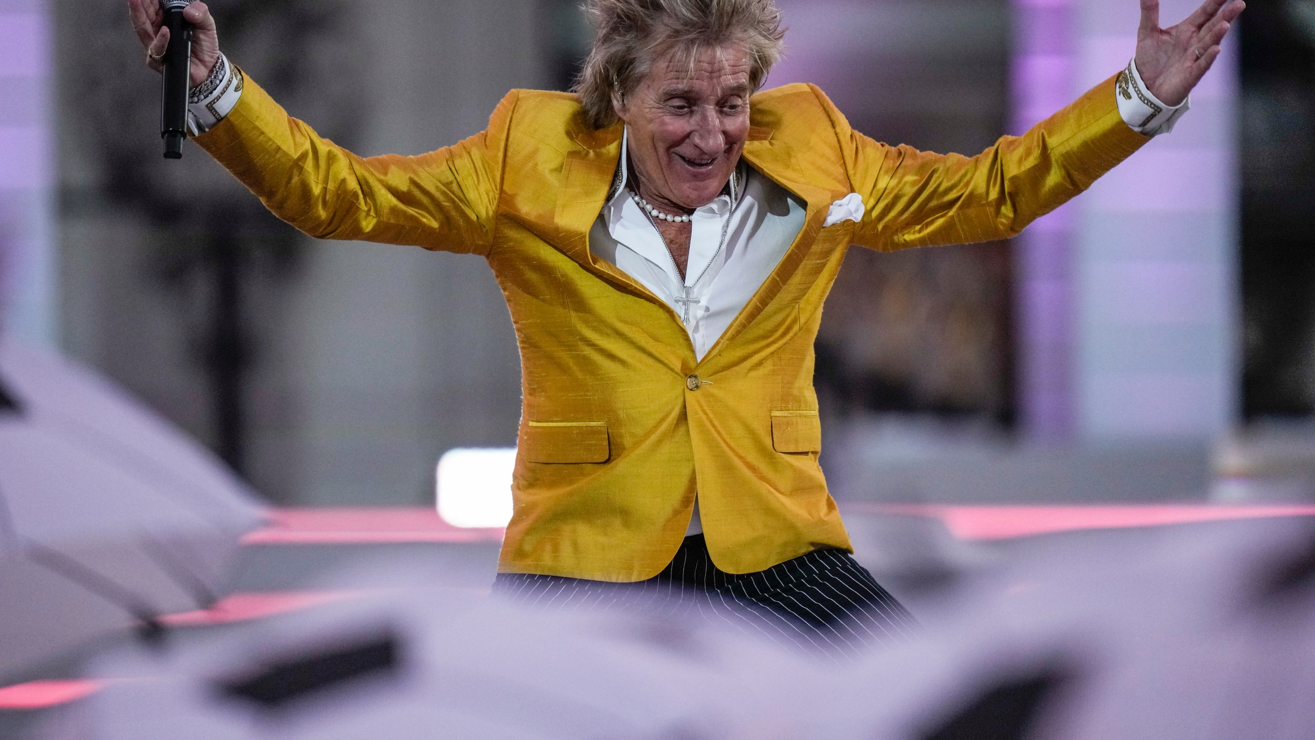 FILE - Rod Stewart performs at the Platinum Jubilee concert taking place in front of Buckingham Palace, London, Saturday June 4, 2022, on the third of four days of celebrations to mark the Platinum Jubilee. (AP Photo/Alastair Grant, Pool, File)