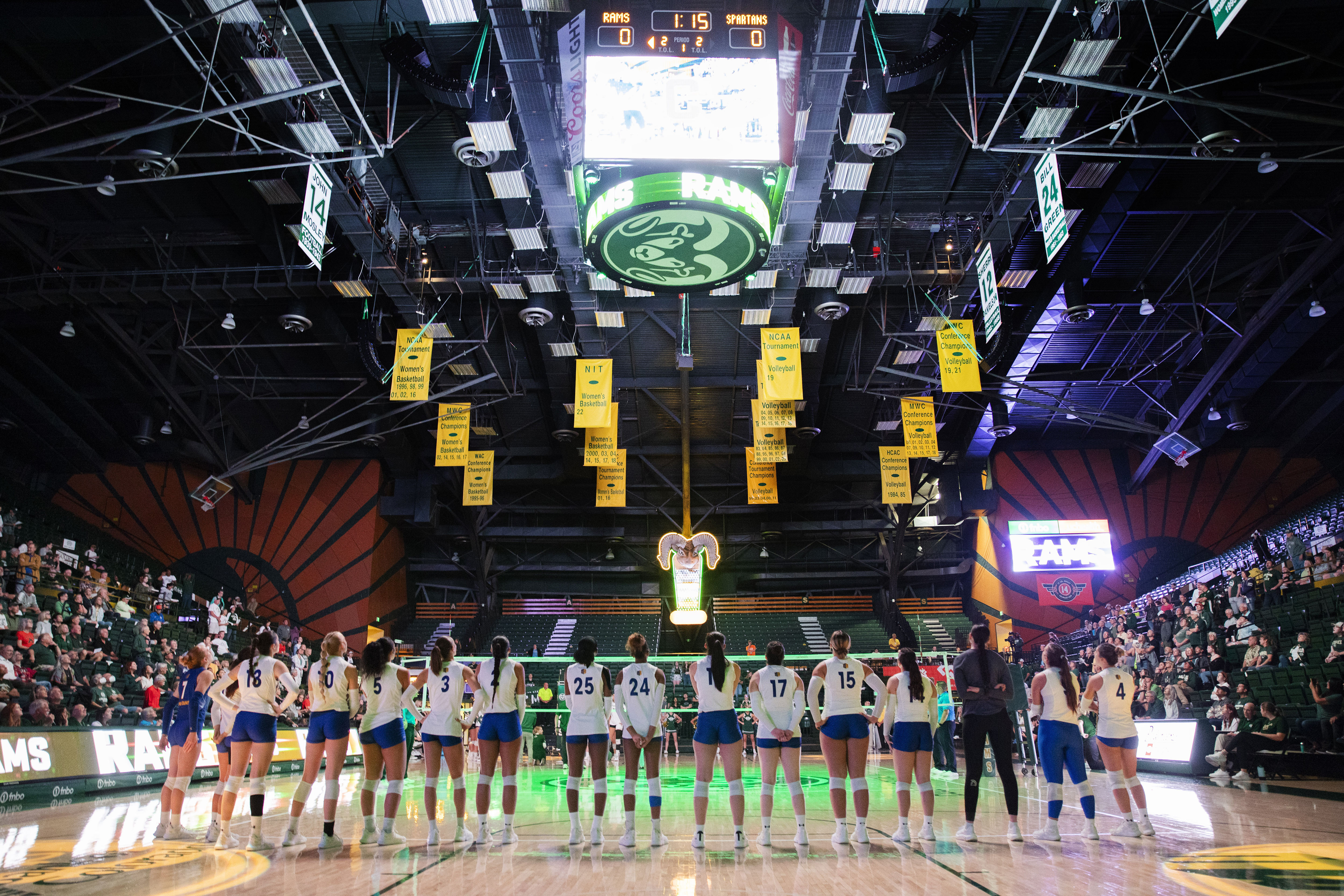 FILE - The San Jose State University Spartans line up for the playing of the national anthem and player introductions for their NCAA Mountain West women's volleyball game against the Colorado State University Rams in Fort Collins, Colo., on Oct. 3, 2024. (Santiago Mejia/San Francisco Chronicle via AP, file)