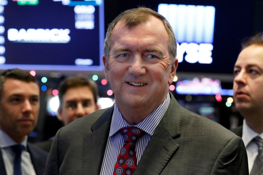 FILE - Barrick Gold Corporation President and CEO Mark Bristow visits the trading floor of the New York Stock Exchange after ringing the opening bell, Wednesday, Jan. 2, 2019. (AP Photo/Richard Drew, File)