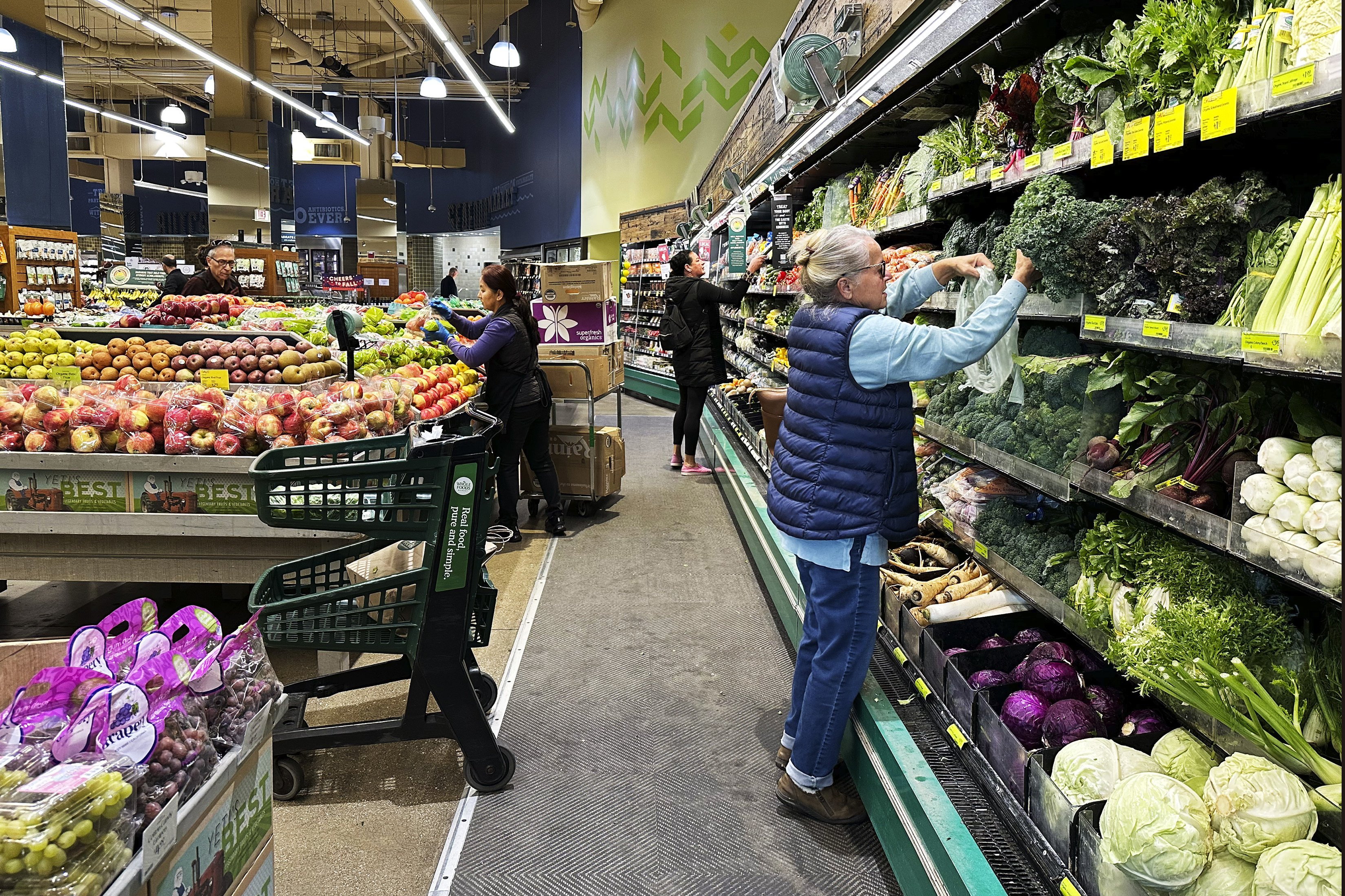 FILE - Customers shop at a grocery store in Chicago, Oct. 25, 2024. (AP Photo/Nam Y. Huh, File)