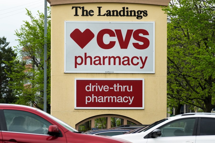 FILE - CVS pharmacy and drive-thru signs are seen outside of a CVS store in Park Ridge, Ill., April 29, 2024. (AP Photo/Nam Y. Huh, File)