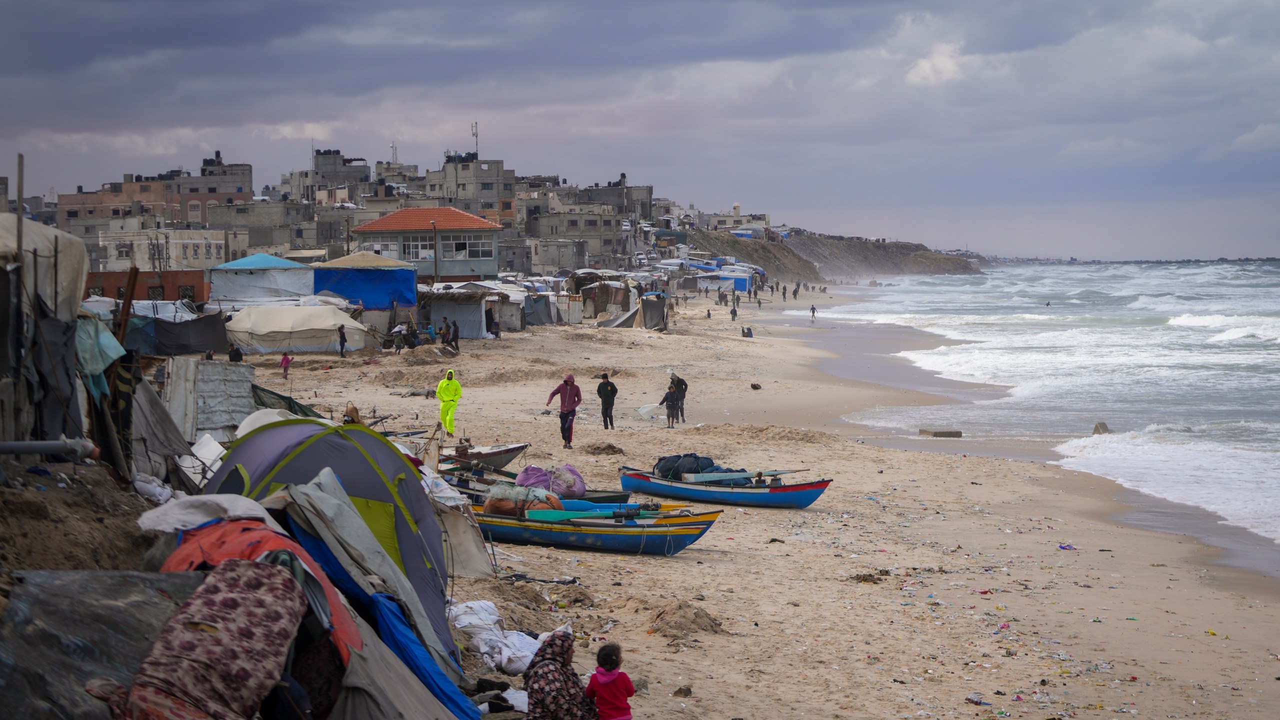 Tents occupied by displaced Palestinians are seen at the beach in Deir al-Balah, Gaza Strip, Tuesday Nov. 26, 2024. (AP Photo/Abdel Kareem Hana)