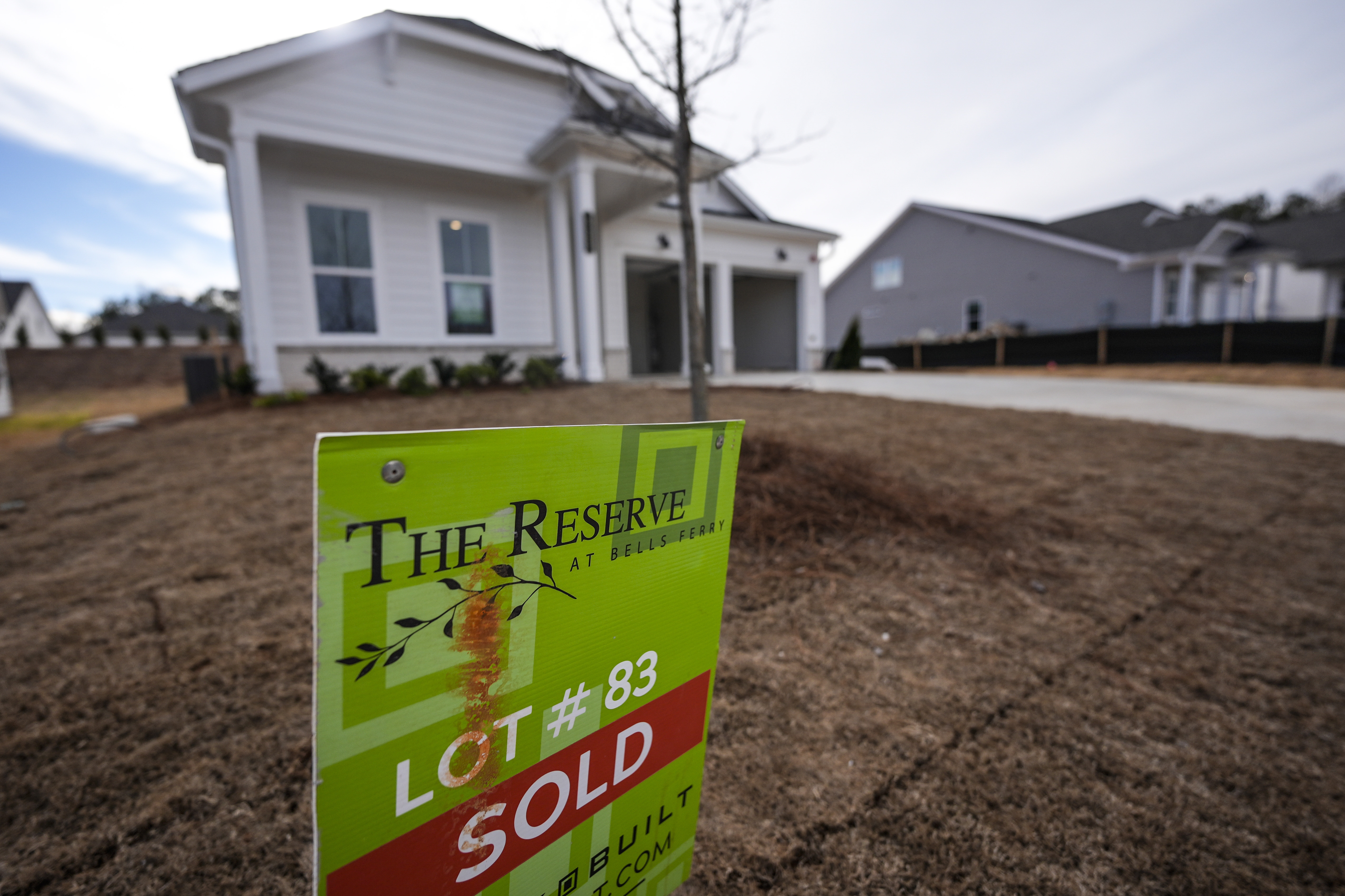 FILE - A sign announces the sale of a new home, Jan. 16, 2024, in Kennesaw, Ga. (AP Photo/Mike Stewart, File)