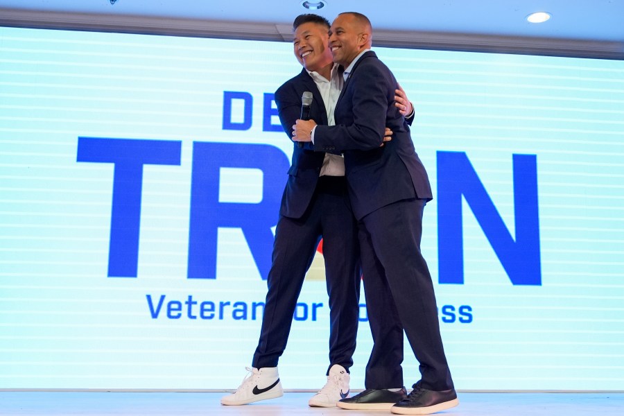 FILE - House Minority Leader Hakeem Jeffries, D-N.Y., greets Derek Tran during a campaign event at Golden Sea Restaurant, Saturday, Oct. 12, 2024, in Anaheim, Calif. (AP Photo/Julia Demaree Nikhinson, File)