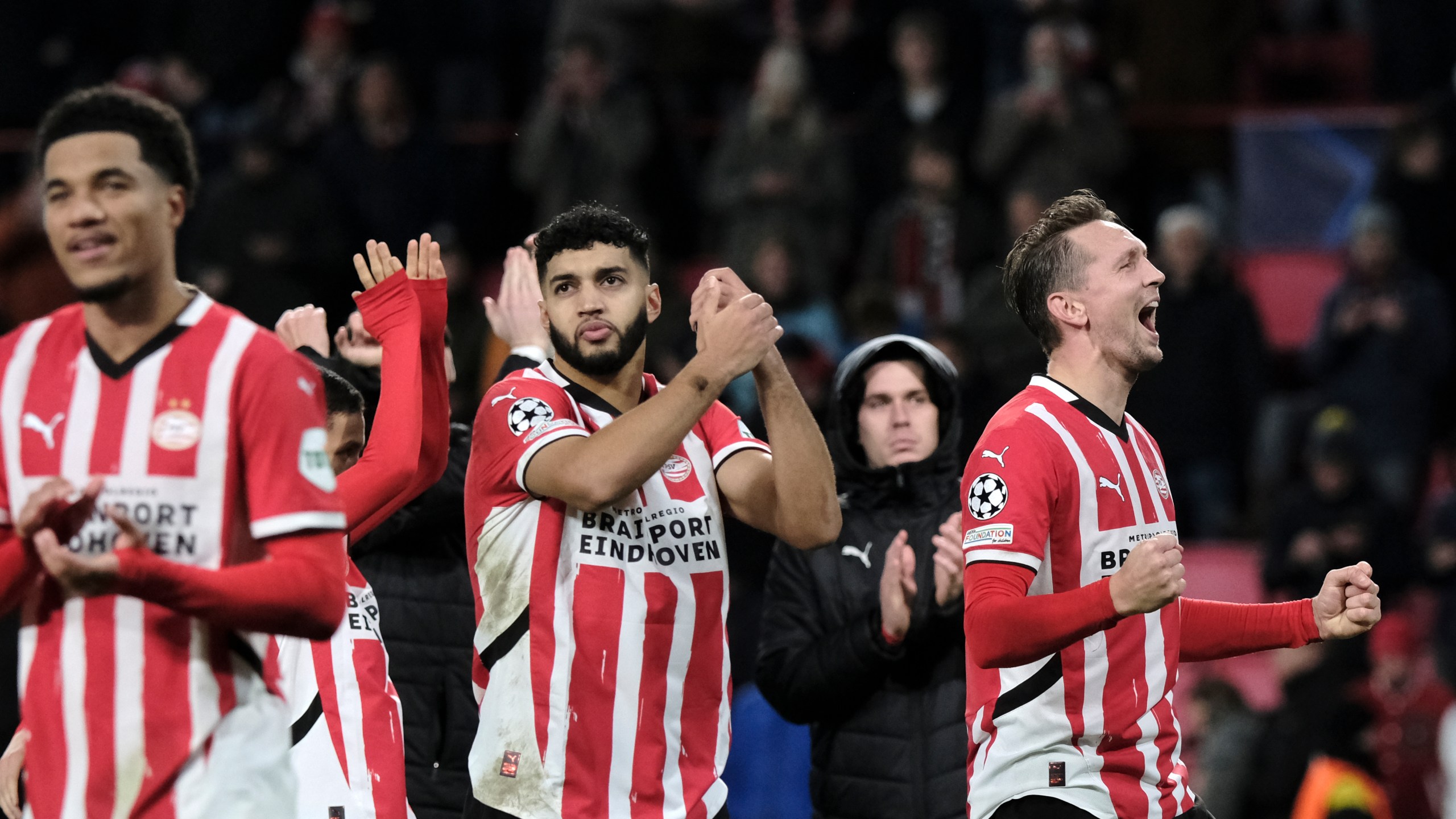 PSV players celebrate after winning their Champions League opening phase soccer match between PSV Eindhoven and Shakhtar Donetsk at the PSV Stadium in Eindhoven, Netherlands, Wednesday, Nov. 27, 2024. (AP Photo/Patrick Post)