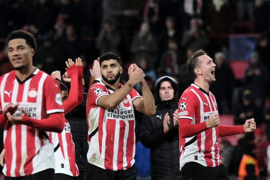 PSV players celebrate after winning their Champions League opening phase soccer match between PSV Eindhoven and Shakhtar Donetsk at the PSV Stadium in Eindhoven, Netherlands, Wednesday, Nov. 27, 2024. (AP Photo/Patrick Post)