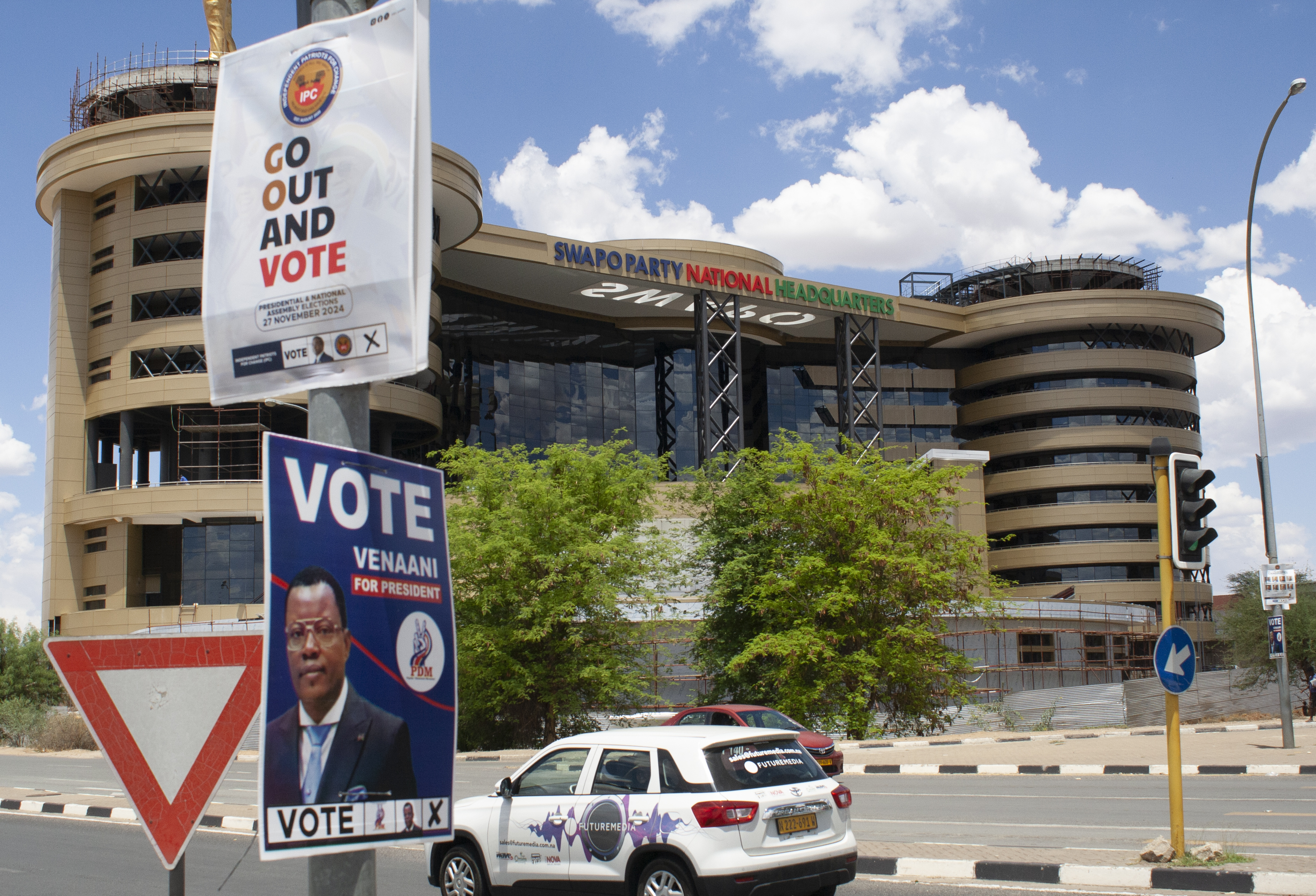 Elections poster of poles in Windhoek, Namibia, Sunday, Nov. 24, 2024 ahead of elections Wednesday, Nov. 27, 2024. (AP Photo/Esther Mbathera)