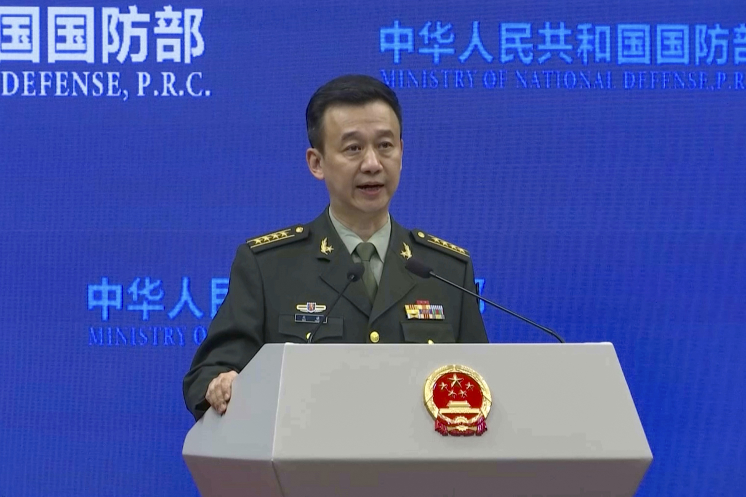 In this image from video, Wu Qian, Chinese Defense Ministry spokesperson, speaks during a Defense Ministry press conference held in Beijing, Thursday, Nov. 28, 2024. (AP Photo/Borg Wong)