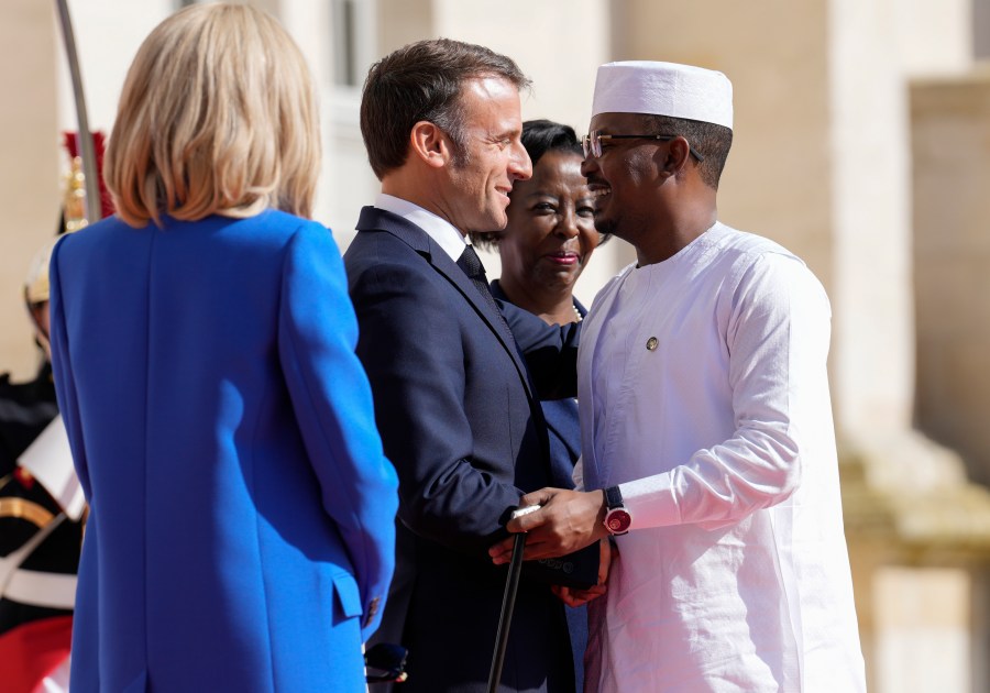 FILE -France's President Emmanuel Macron, left, and Secretary General of the Organisation Internationale de la Francophonie Louise Mushikiwabo, center, welcome Chad's President General Mahamat Idriss Deby Itno for the 19th Francophonie summit in Villers-Cotterets, France, Oct. 4, 2024. (AP Photo/Aurelien Morissard, File)