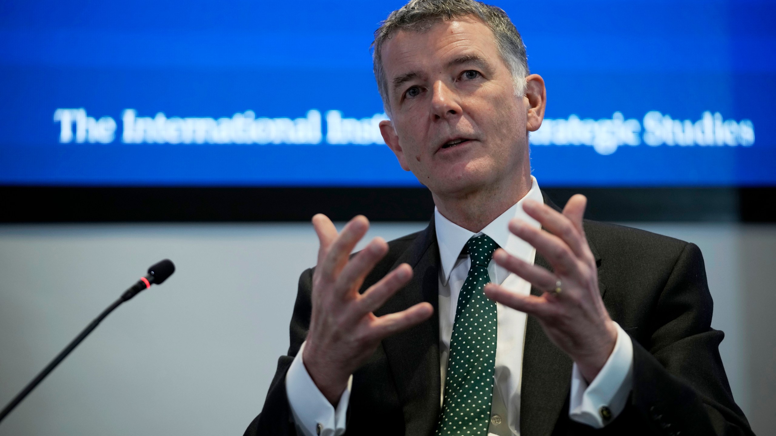 FILE - Richard Moore, the Chief of Britain's Secret Intelligence Service, also known as MI6, answers questions at the International Institute for Strategic Studies, in London, on Nov. 30, 2021. (AP Photo/Matt Dunham, File)