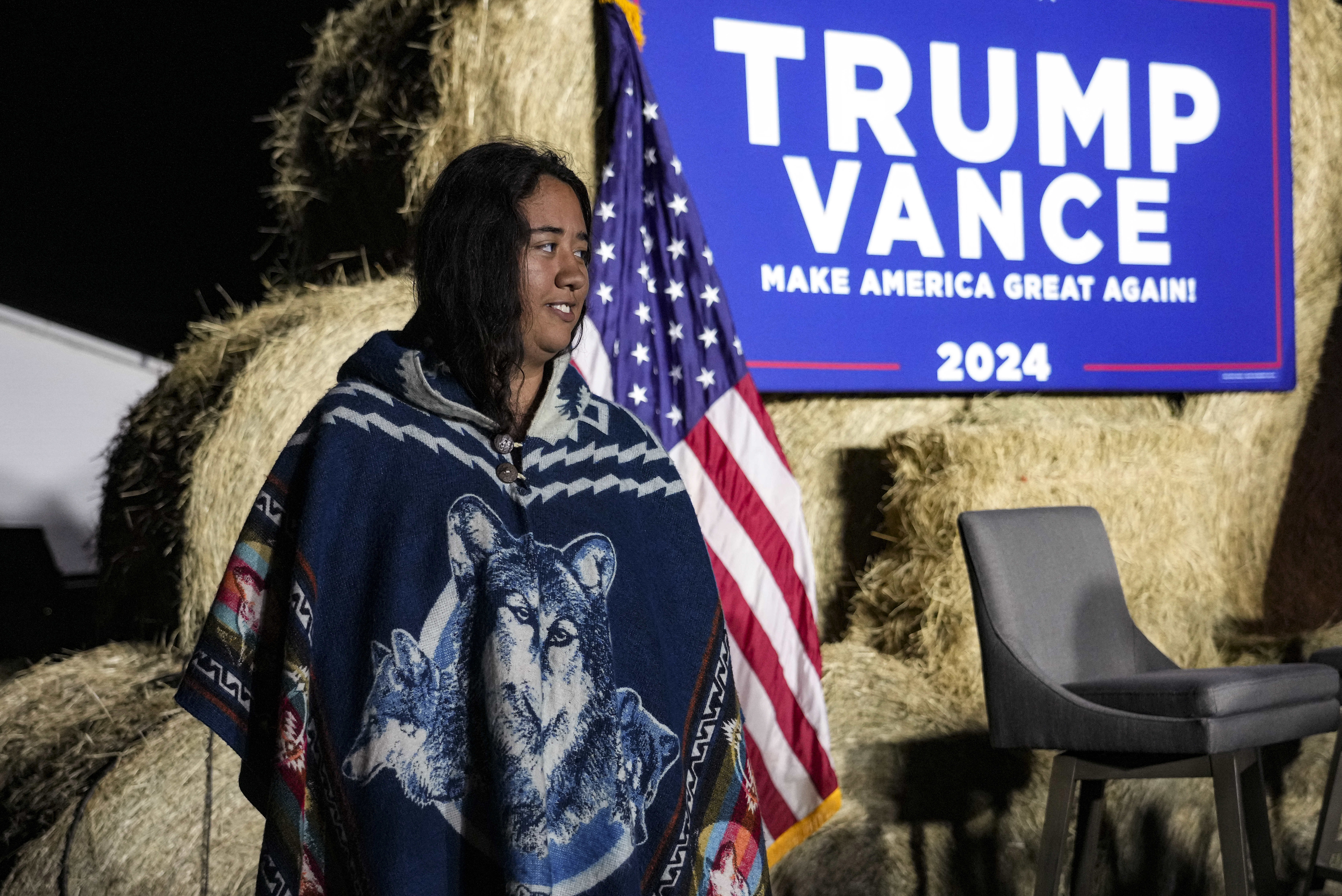 FILE - Abigail Blue, a member of the Lumbee Tribe, walks by the stage during a campaign event in support of Republican presidential nominee former President Donald Trump, Oct. 18, 2024, in Red Springs, N.C. (AP Photo/David Yeazell, File)