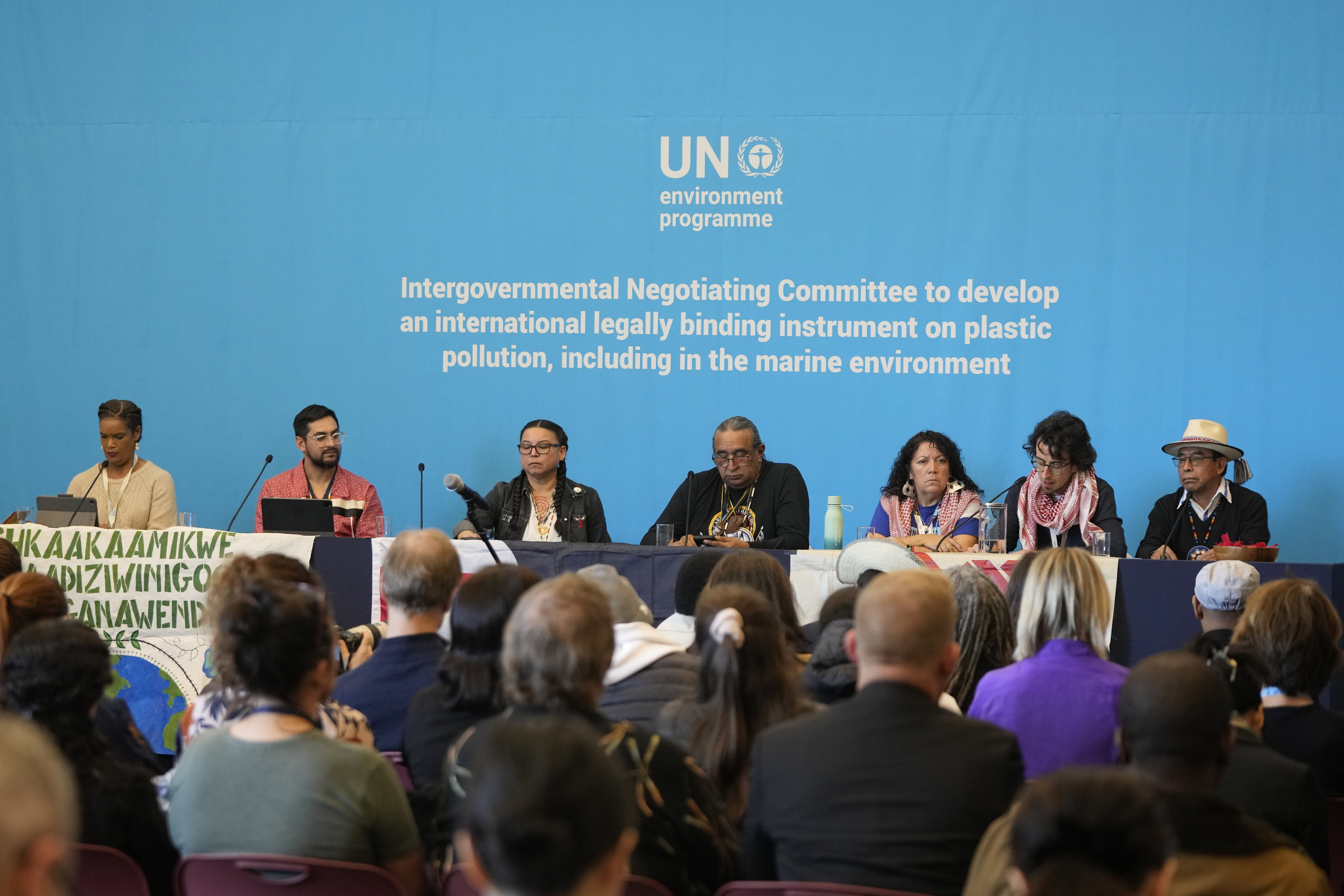 Members of The International Indigenous Peoples' Forum on Plastics attend a press conference at the fifth session of the Intergovernmental Negotiating Committee on Plastic Pollution in Busan, South Korea, Saturday, Nov. 30, 2024. (AP Photo/Ahn Young-joon)