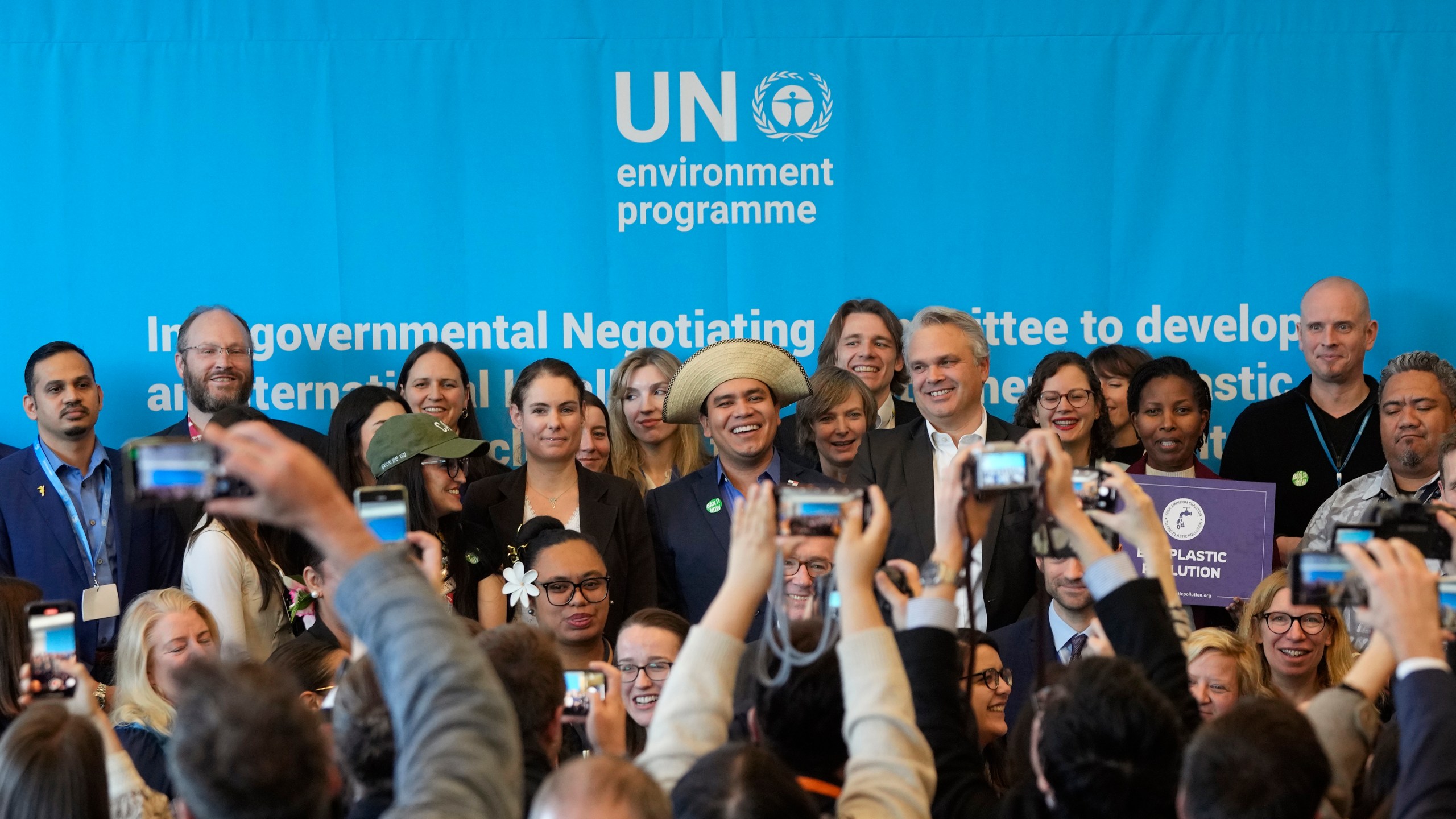 Third from right, Juliet Kabera, director general of the Rwanda Environment Management Authority and Rwanda's lead negotiator to the INC, Anthony Agotha, special envoy for Climate and Environment Diplomacy, European Union, Juan Carlos Monterrey, head of Panama's delegation, Olga Givernet, French Delegate Minister for Energy, and Camila Zepeda, head of delegation for Mexico, pose after a press conference at the fifth session of the Intergovernmental Negotiating Committee on Plastic Pollution in Busan, South Korea, Sunday, Dec. 1, 2024. (AP Photo/Ahn Young-joon)