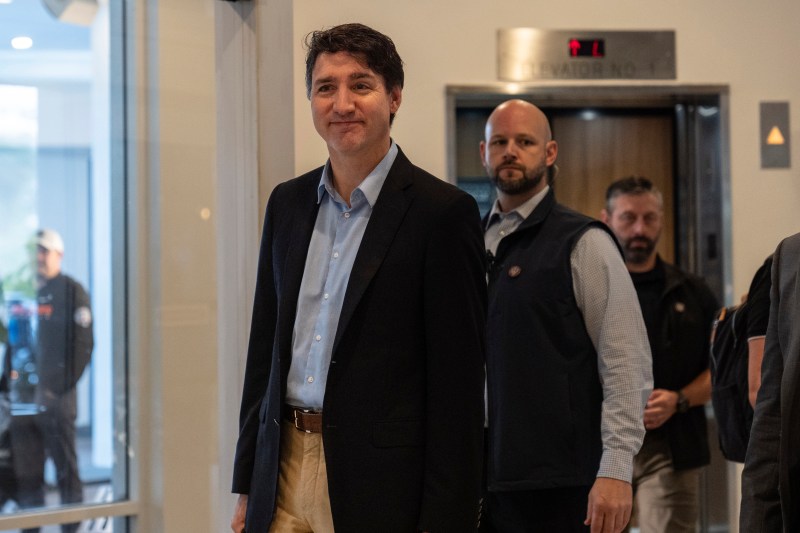 Canada Prime Minister Justin Trudeau walks through the lobby of the Delta Hotel by Marriott, Saturday, Nov. 30, 2024, in West Palm Beach, Fla. (AP Photo/Carolyn Kaster)