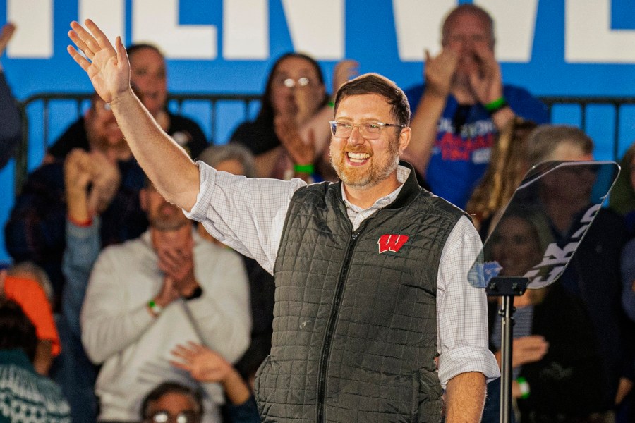 FILE - Ben Wikler, chair of the Democratic Party of Wisconsin, waves to the crowd at a campaign event, Nov. 1, 2024, in Little Chute, Wis. (AP Photo/Andy Manis, File)