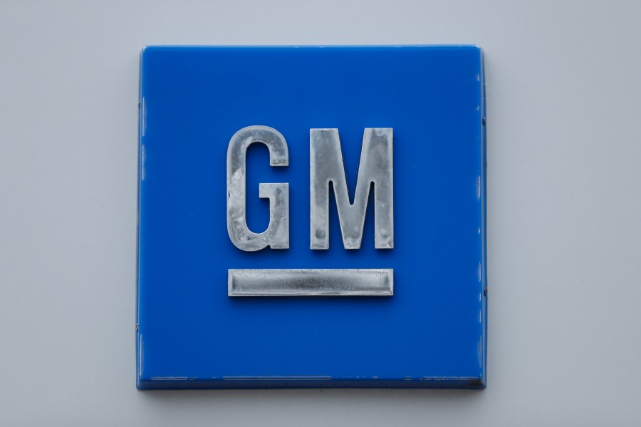 FILE - A GM logo is shown at the General Motors Detroit-Hamtramck Assembly plant in Hamtramck, Mich., Jan. 27, 2020. (AP Photo/Paul Sancya, File)