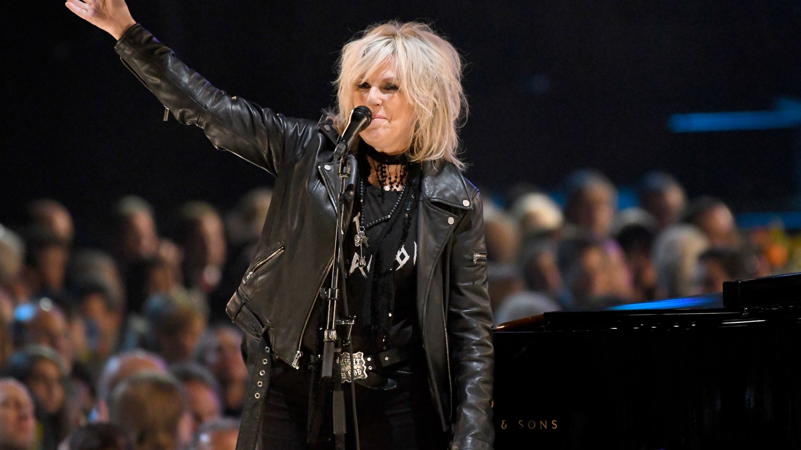 FILE - Lucinda Williams performs at the MusiCares Person of the Year tribute honoring Tom Petty in Los Angeles, Feb. 10, 2017. (Photo by Chris Pizzello/Invision/AP, File)