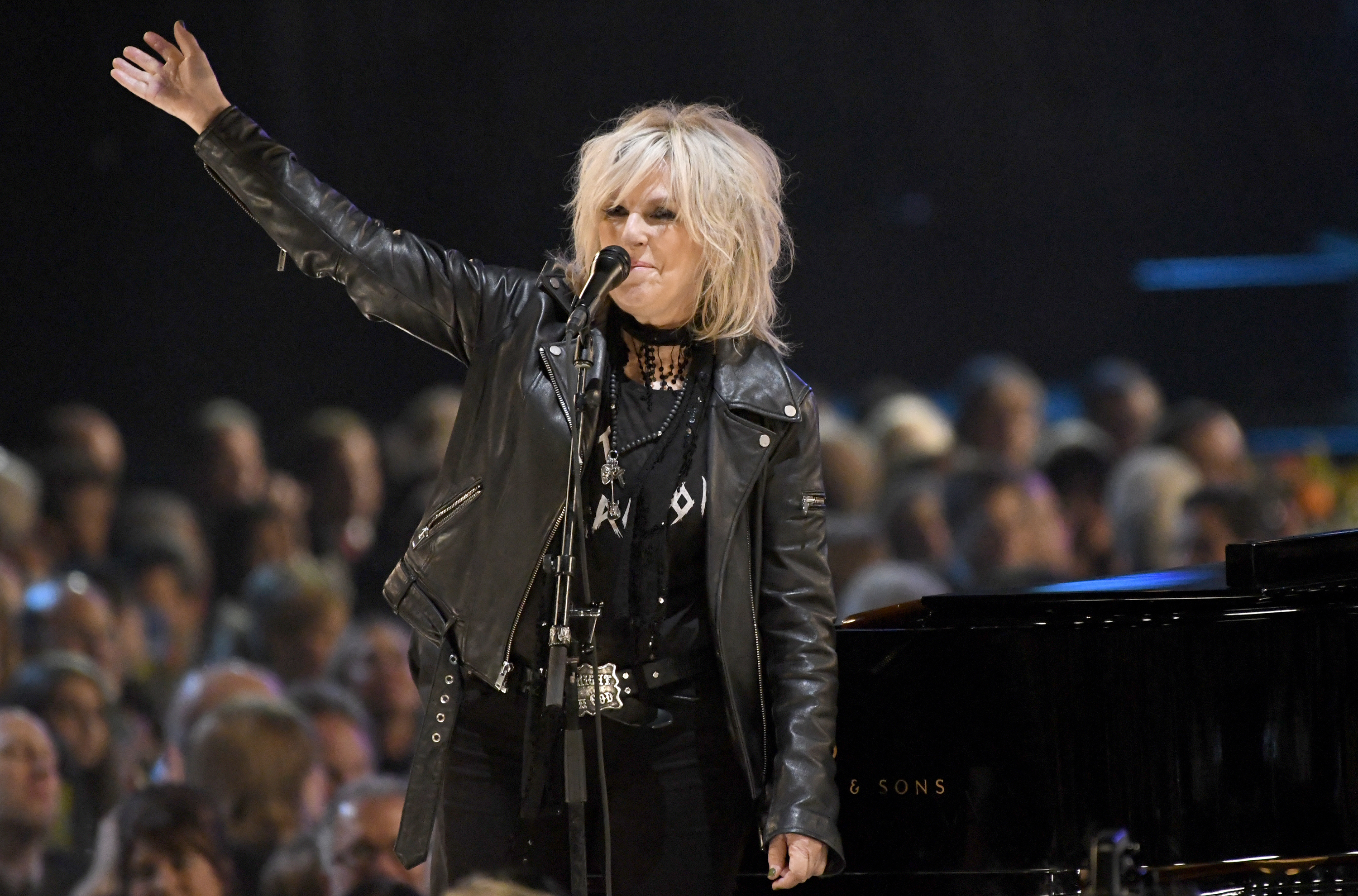 FILE - Lucinda Williams performs at the MusiCares Person of the Year tribute honoring Tom Petty in Los Angeles, Feb. 10, 2017. (Photo by Chris Pizzello/Invision/AP, File)