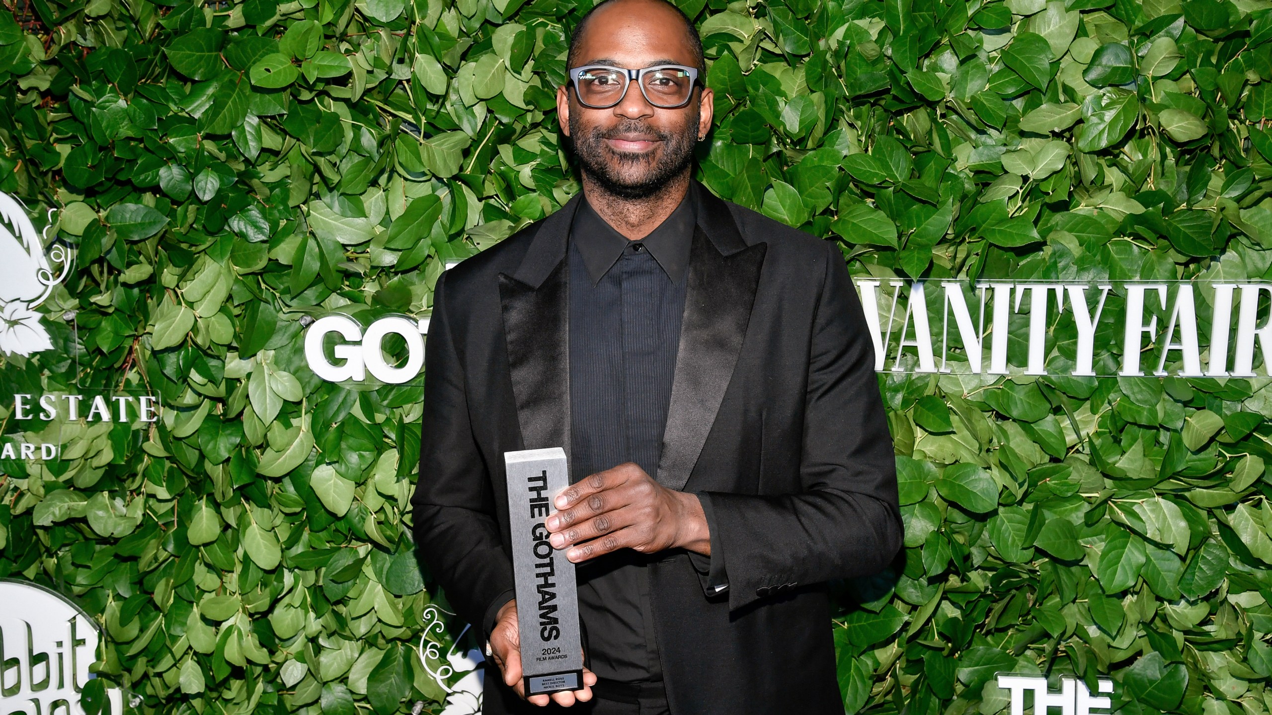 Filmmaker and photographer RaMell Ross poses with the best director award for "Nickel Boys" during The Gothams Film Awards at Cipriani Wall Street on Monday, Dec. 2, 2024, in New York. (Photo by Evan Agostini/Invision/AP)