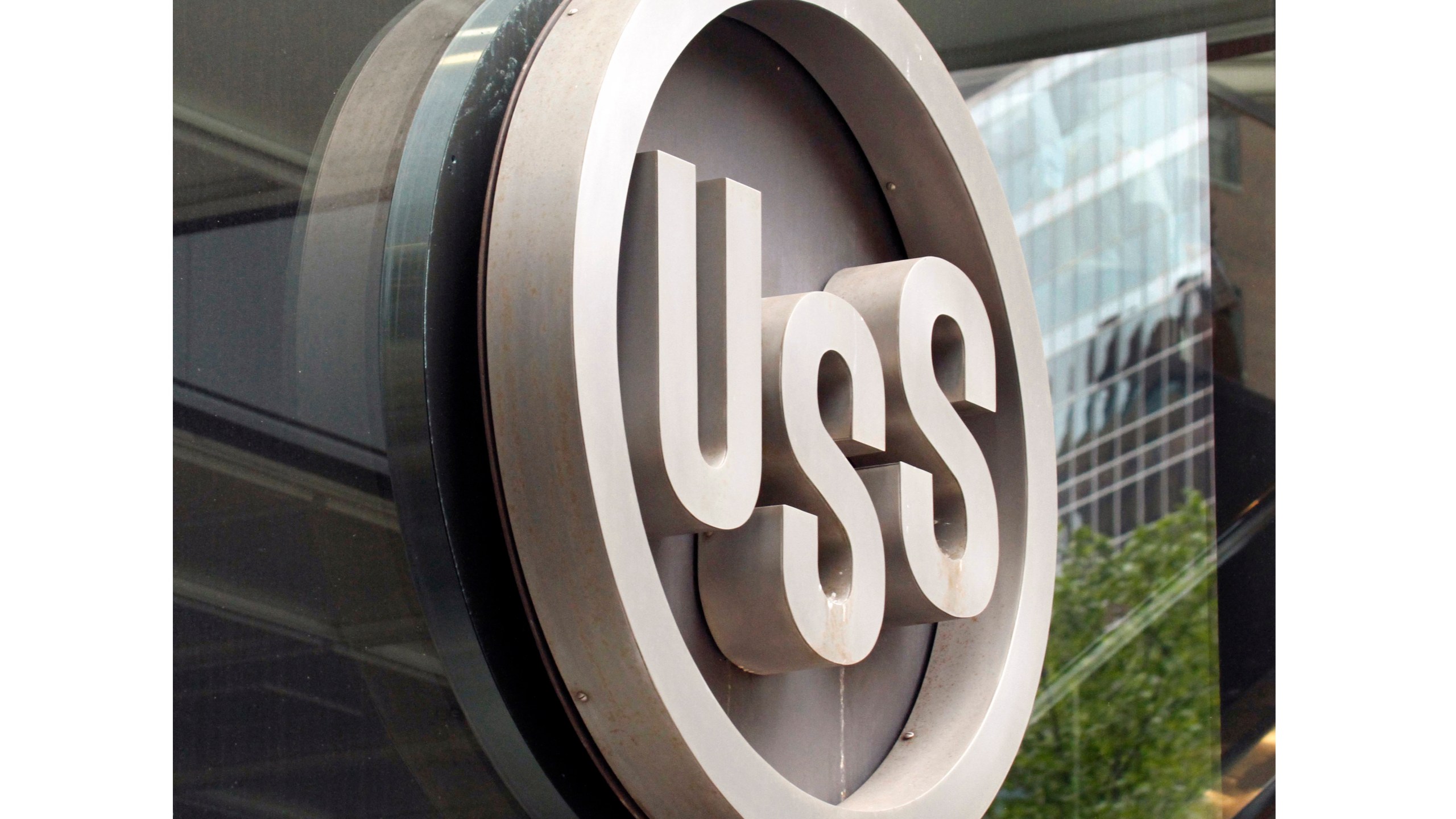 FILE - This April 26, 2010, file photo shows the United States Steel logo outside the headquarters building in downtown Pittsburgh. President-elect Donald Trump is underscoring his intention to block the purchase of U.S. Steel by Japanese steelmaker Nippon Steel Corp., and he’s pledging to use tax incentives and tariffs to strengthen the iconic American steelmaker. Trump said during the campaign that he would “instantaneously” block the deal, and he reiterated that sentiment in a Monday night statement.(AP Photo/Gene J. Puskar, File)