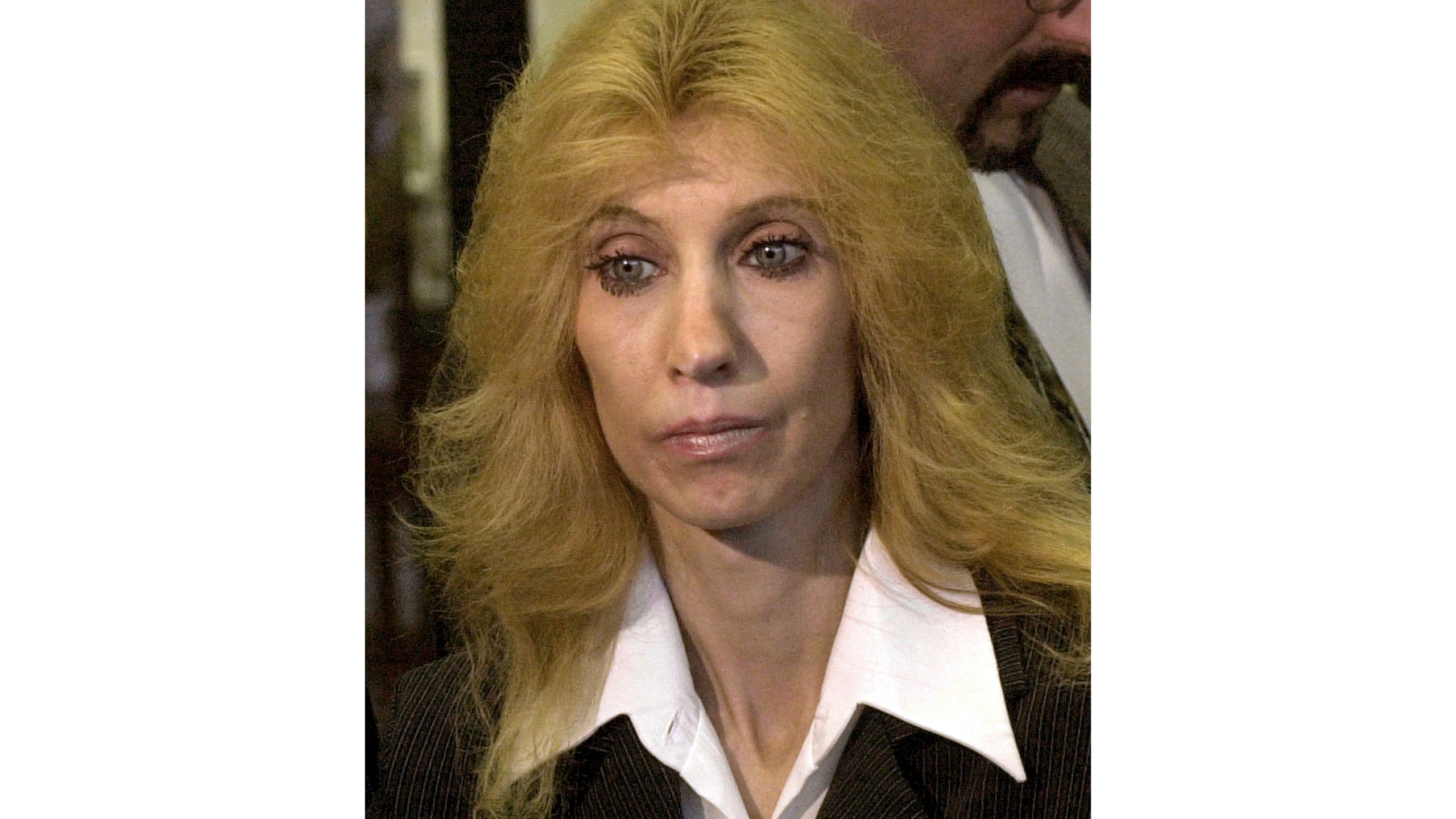 FILE - Debbie Nelson, mother of rap star Eminem, appears in Mount Clemens, Mich., on April 10, 2001. (AP Photo/Paul Sancya, File)