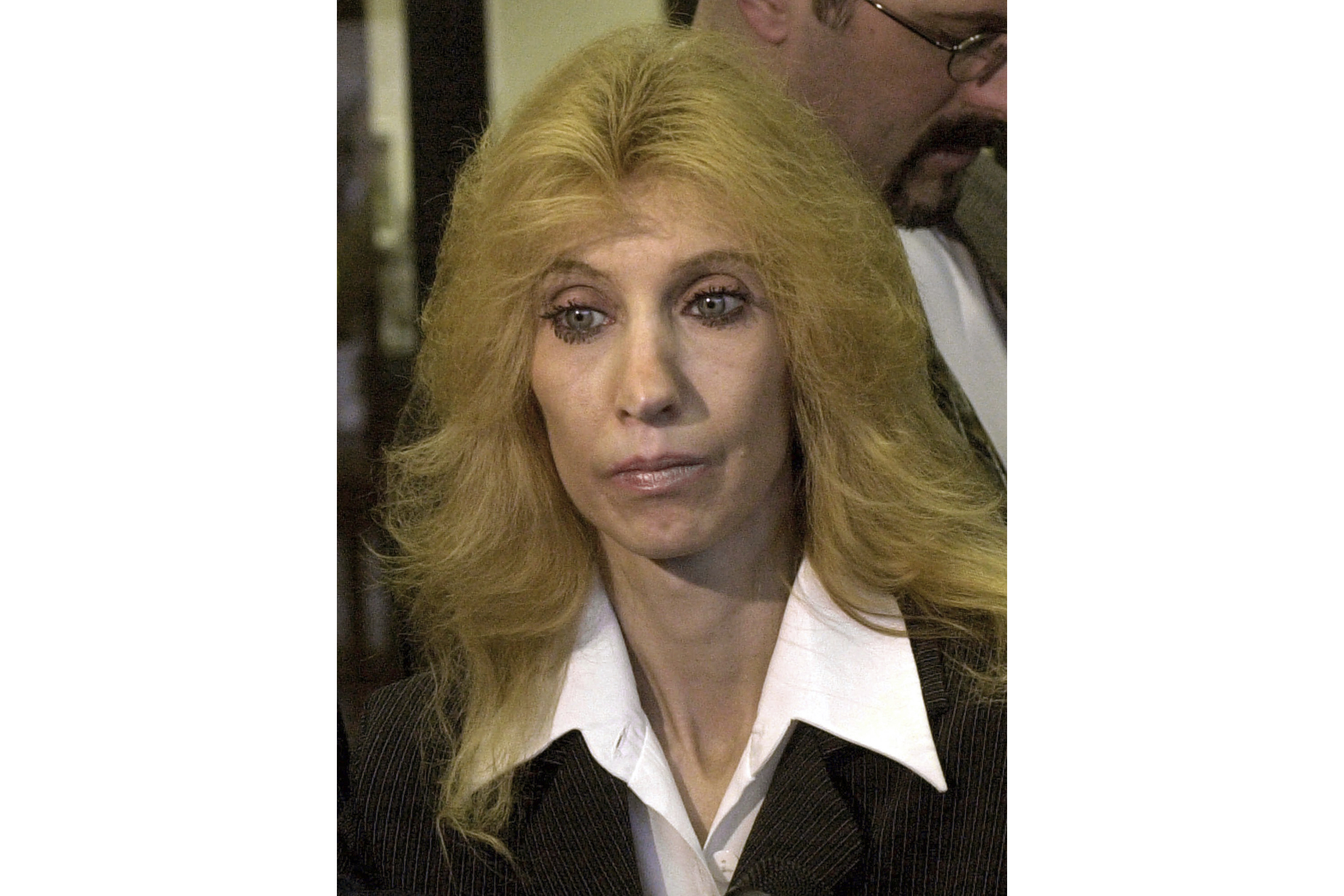 FILE - Debbie Nelson, mother of rap star Eminem, appears in Mount Clemens, Mich., on April 10, 2001. (AP Photo/Paul Sancya, File)