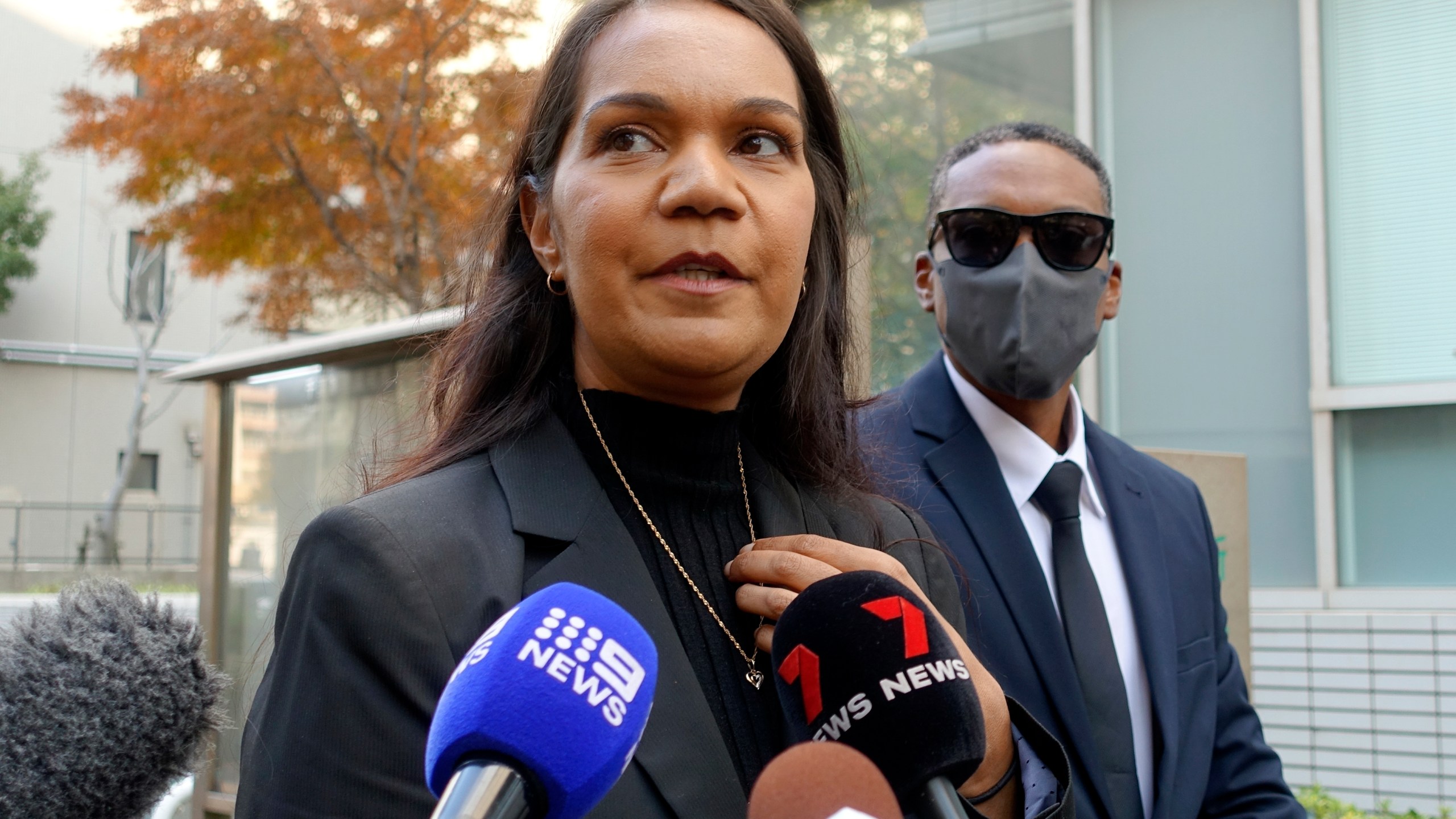 Kristal Hilaire, a daughter of Australian citizen Donna Nelson, speaks to reporters at the Chiba District Court before the verdict for Nelson in a drug smuggling case, Wednesday, Dec. 4, 2024, in Chiba, east of Tokyo. (AP Photo/Mari Yamaguchi)