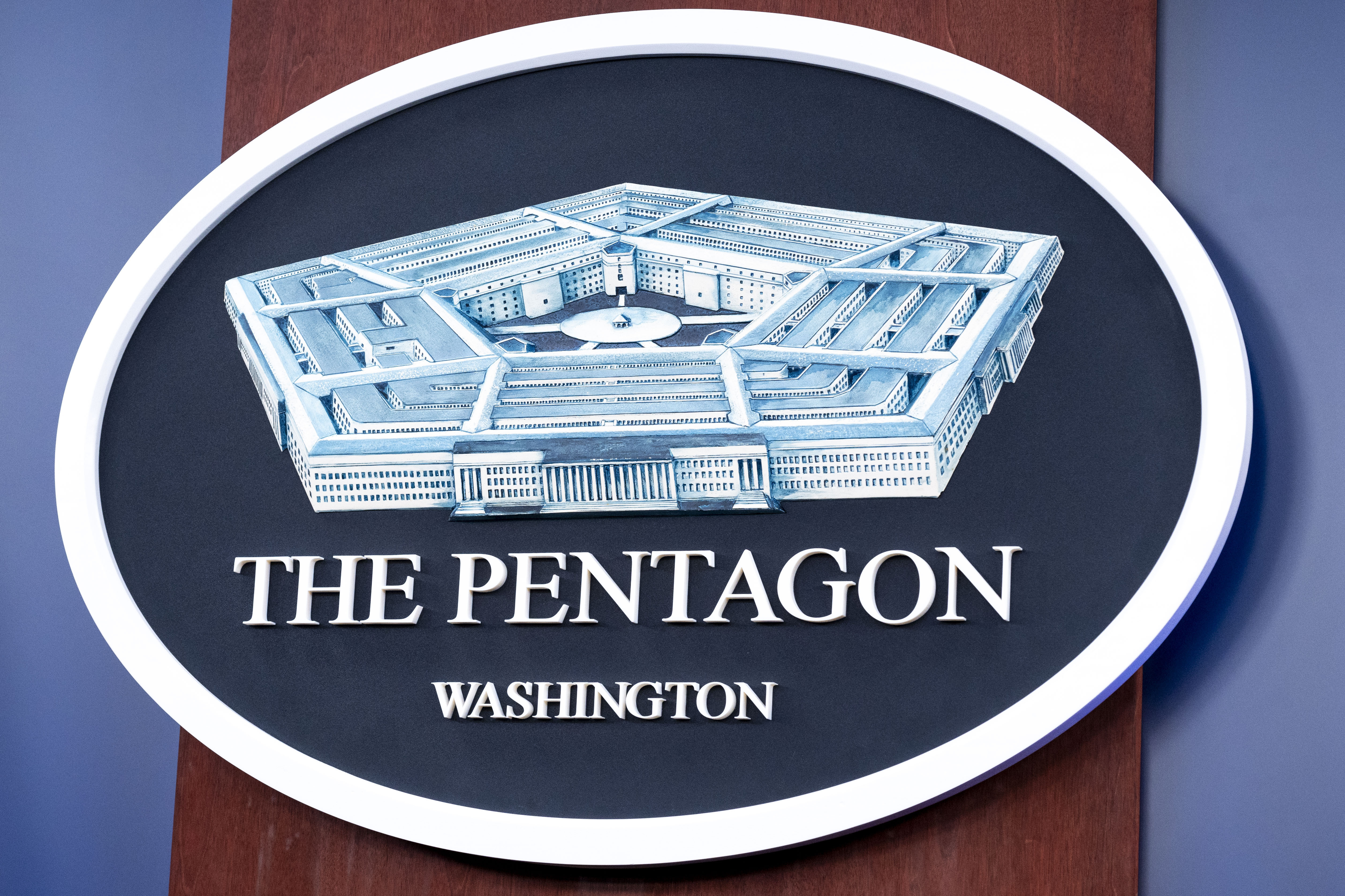 The Department of Defense logo is seen on the wall in the Press Briefing room at the Pentagon on Tuesday, Oct. 29, 2024 in Washington. (AP Photo/Kevin Wolf)