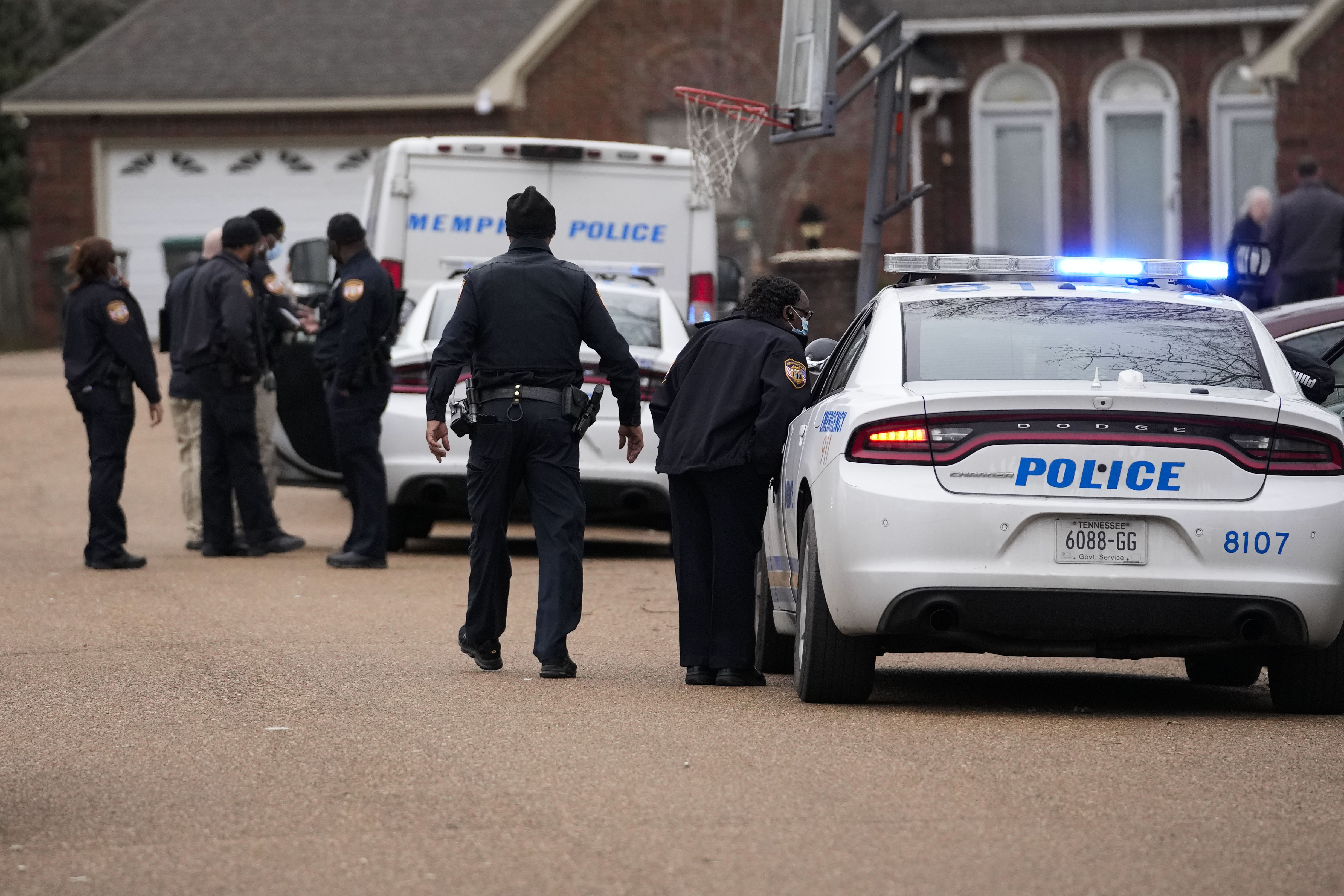 FILE - Members of the Memphis Police Department work a crime scene in Memphis, Tenn., Tuesday, Jan. 24, 2023. (AP Photo/Gerald Herbert, File)