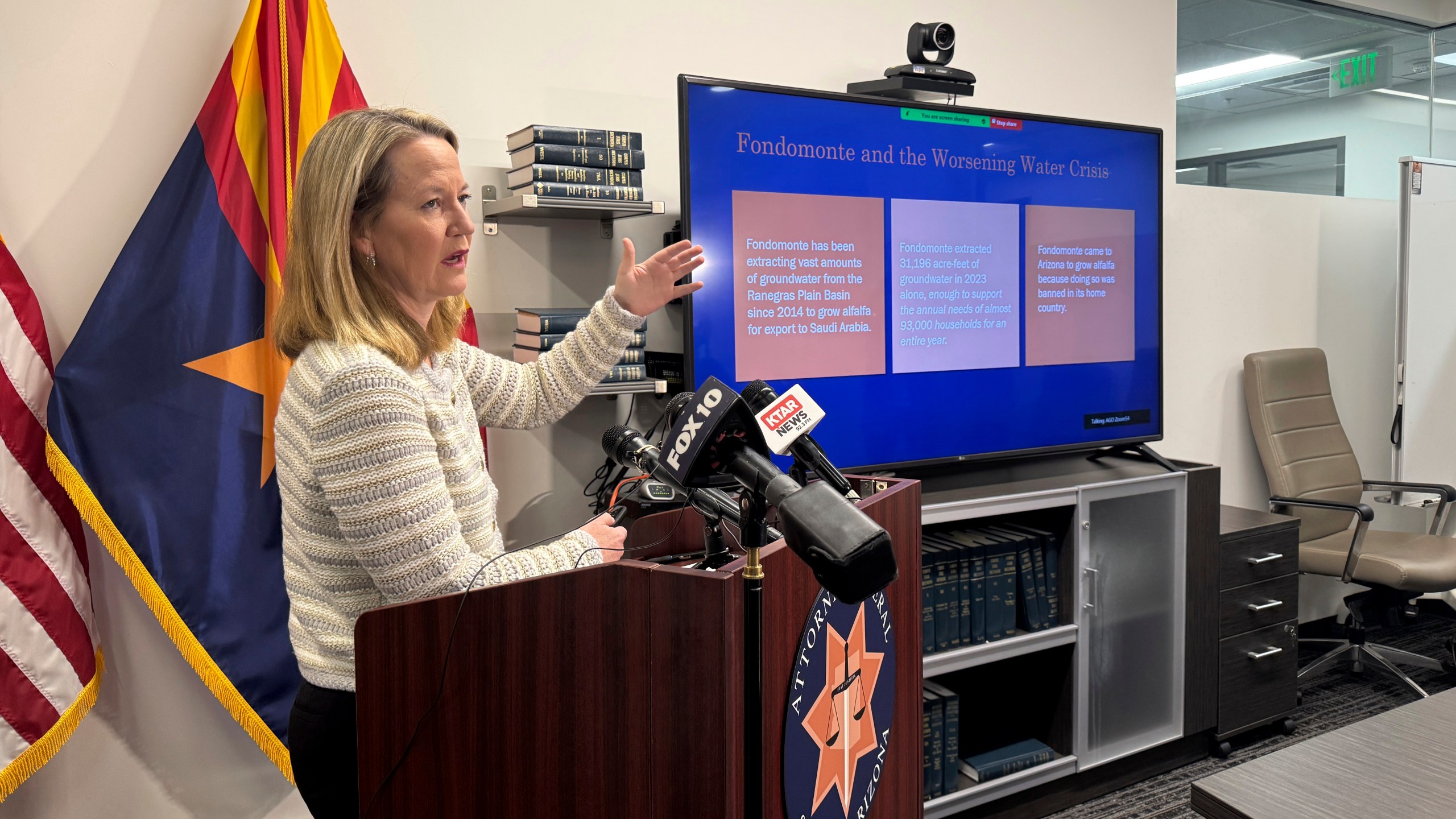 Arizona Attorney General Kris Mayes announces she's suing a Saudi Arabian company for allegedly pumping groundwater that harms local communities in a rural western county, Wednesday, Dec. 11, 2024, in Phoenix. (AP Photo/Gabriel Sandoval)