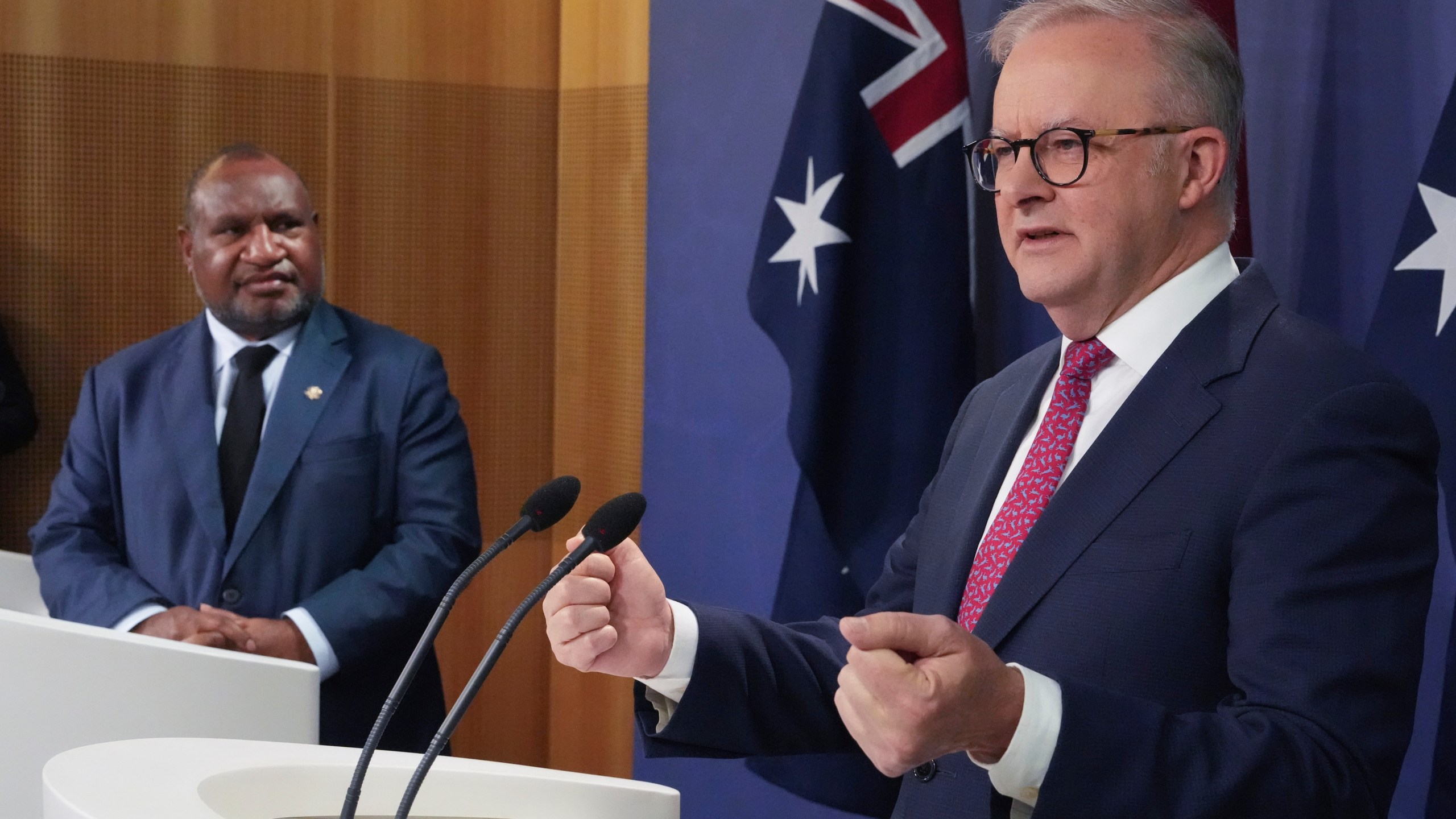 Australian Prime Minister Anthony Albanese, right, gestures during a press conference with Papua New Guinea Prime Minister James Marape in Sydney, Australia, Thursday, Dec. 12, 2024. (AP Photo/Mark Baker)